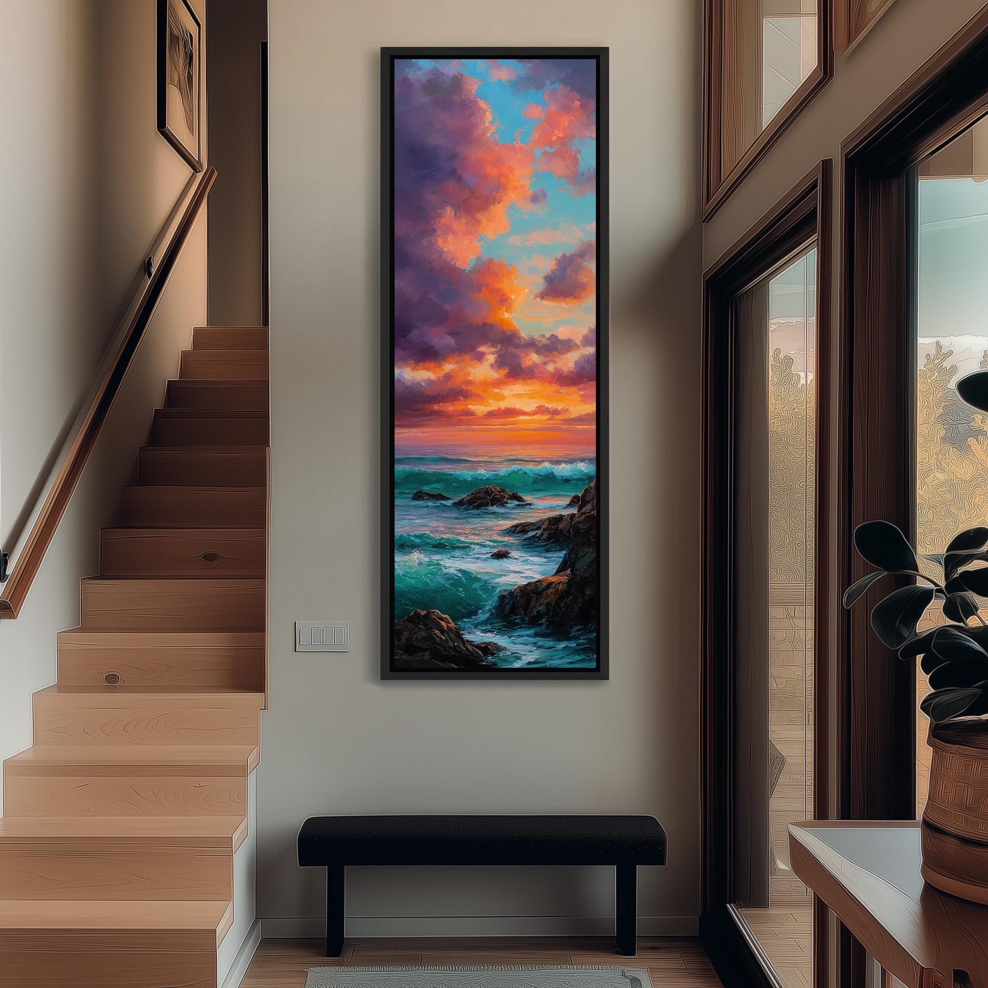 a large painting of a seascape hanging on the wall of a room with wooden stairs and a bench.