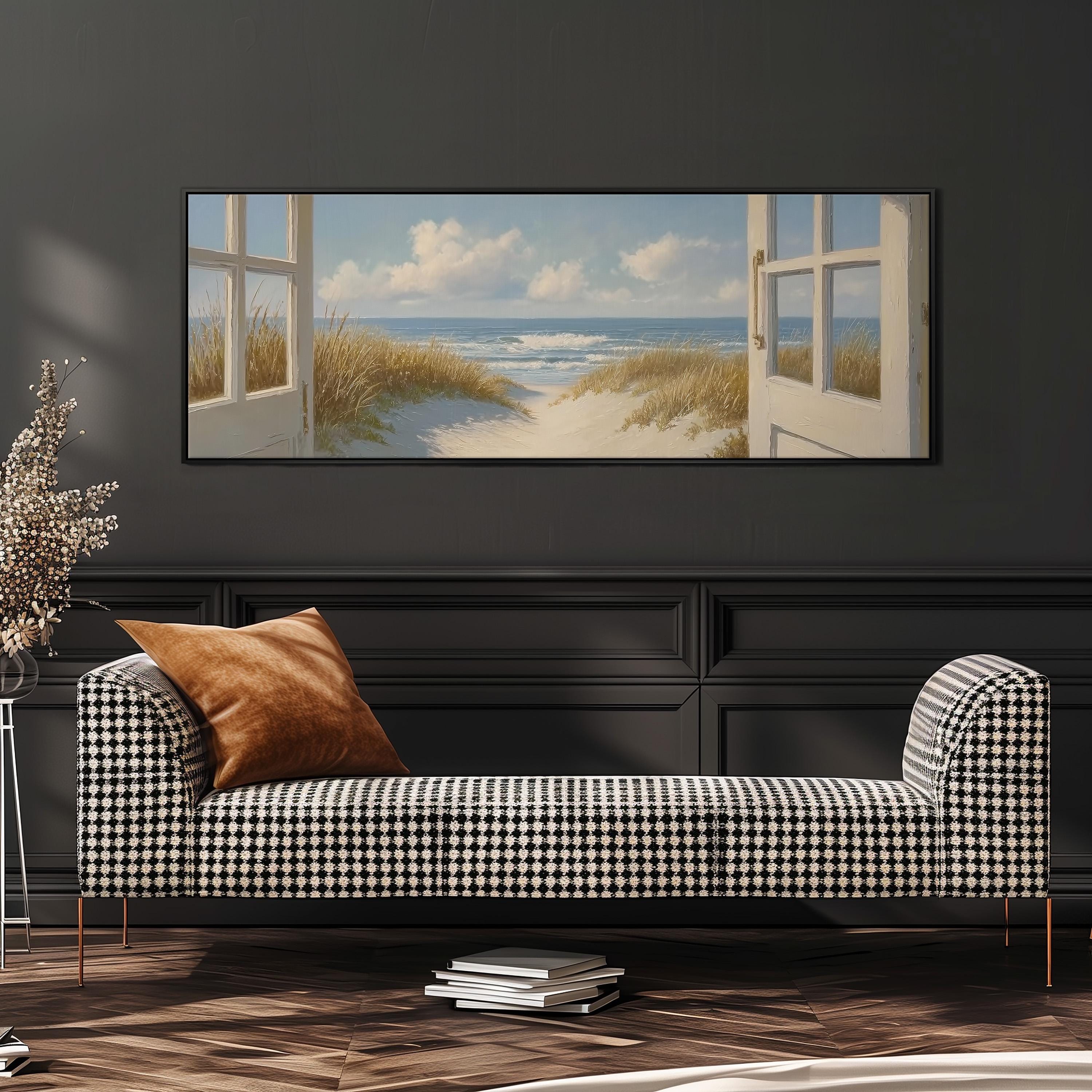 a large painting of a beach scene with open windows, hanging on a wall above a black and white checkered sofa.