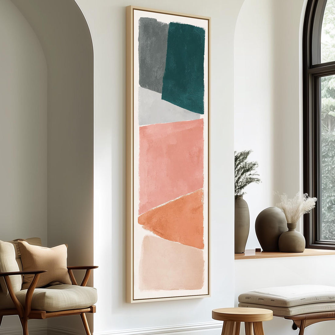 a modern living room with a large abstract painting hanging on the wall, a wooden chair, a small table, and a window with a plant on the sill.