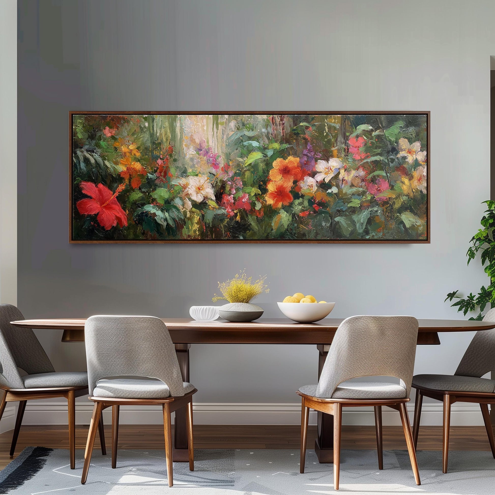 a dining room with a large painting of a colorful garden hanging on the wall above a wooden dining table with four chairs. The table is set with a bowl of fruit and a vase of flowers, creating a welcoming and vibrant atmosphere.