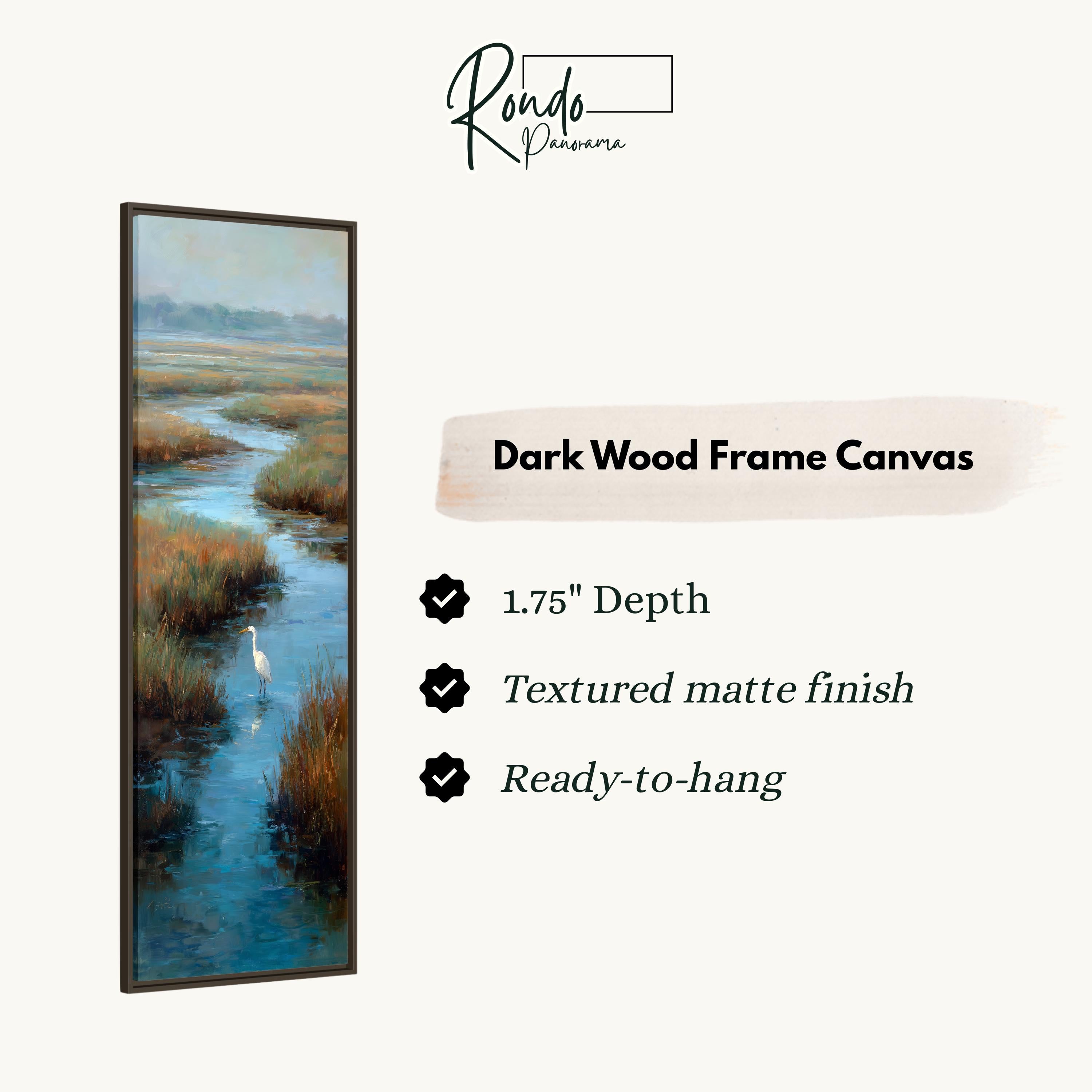 The image is a rectangular dark wood frame canvas depicting a serene landscape with a bird standing in a body of water.
