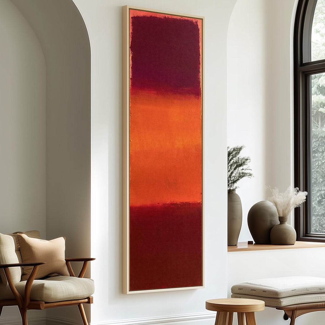 Color field bands in maroon, orange and red long vertical canvas print in a sunlit living space