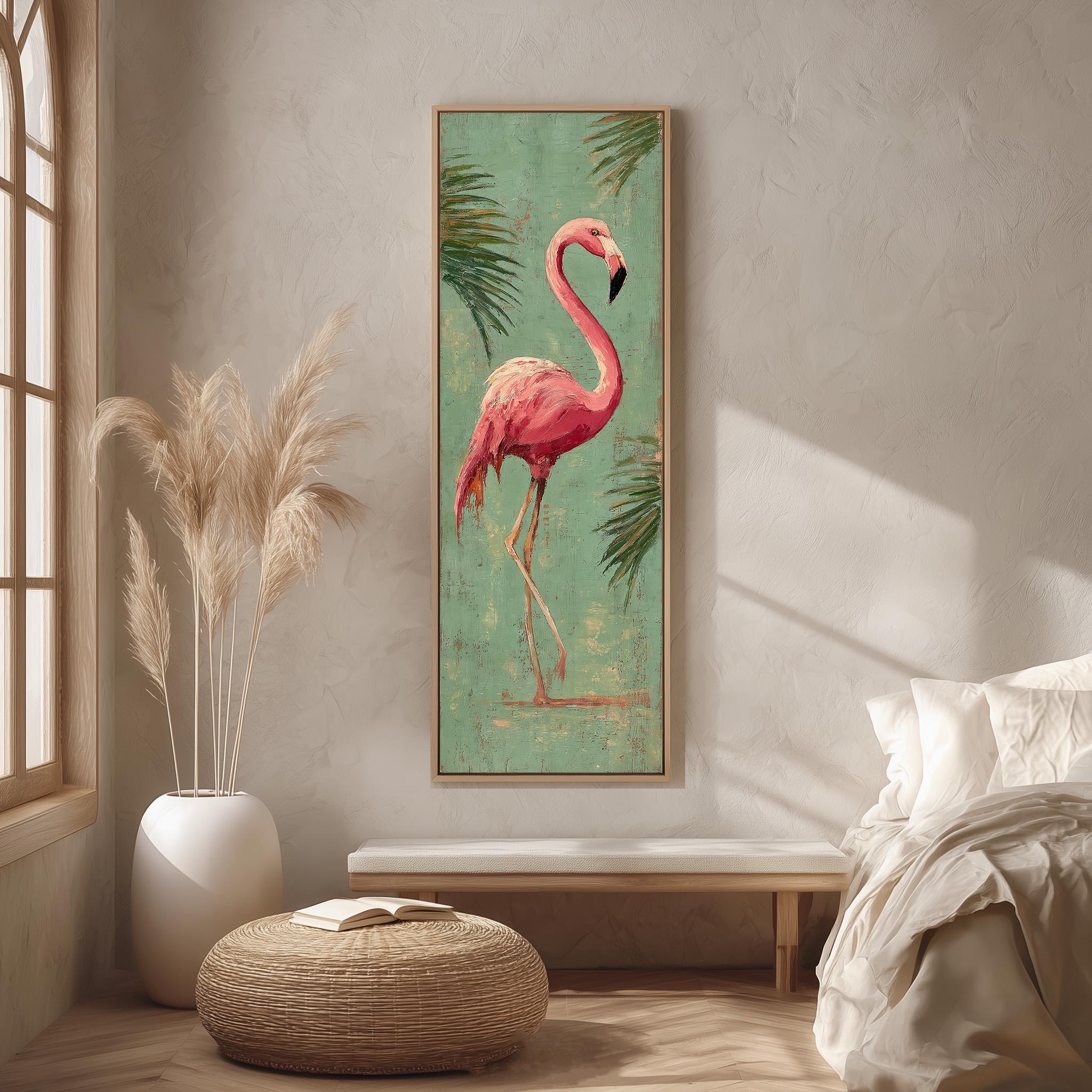 a large framed painting of a pink flamingo standing on one leg, hanging on a wall in a room with a window, a white bed, and a woven ottoman.