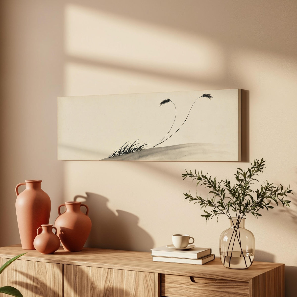 Two birds perched on bending ink reeds long horizontal canvas print above a wooden sideboard