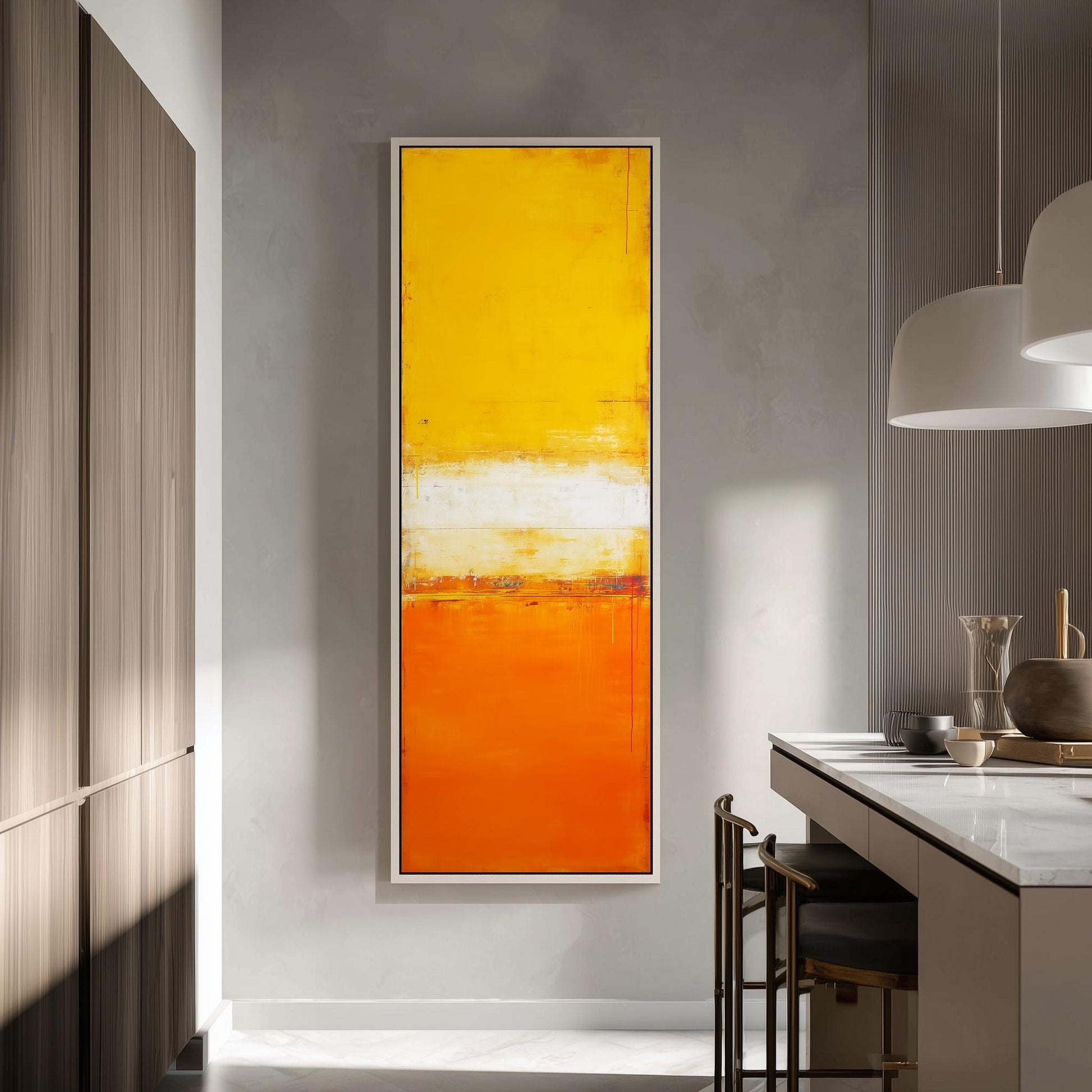 a modern kitchen with a large, vibrant orange and yellow abstract painting hanging on the wall. The kitchen has a white countertop and a wooden cabinet, creating a clean and minimalist aesthetic.
