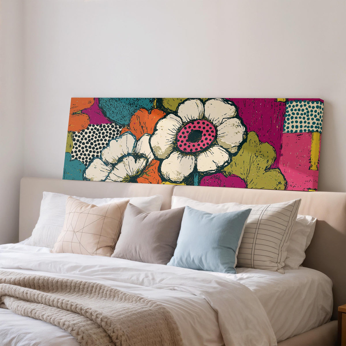 Bold pop blossoms wide panoramic canvas print above a bed in a bedroom