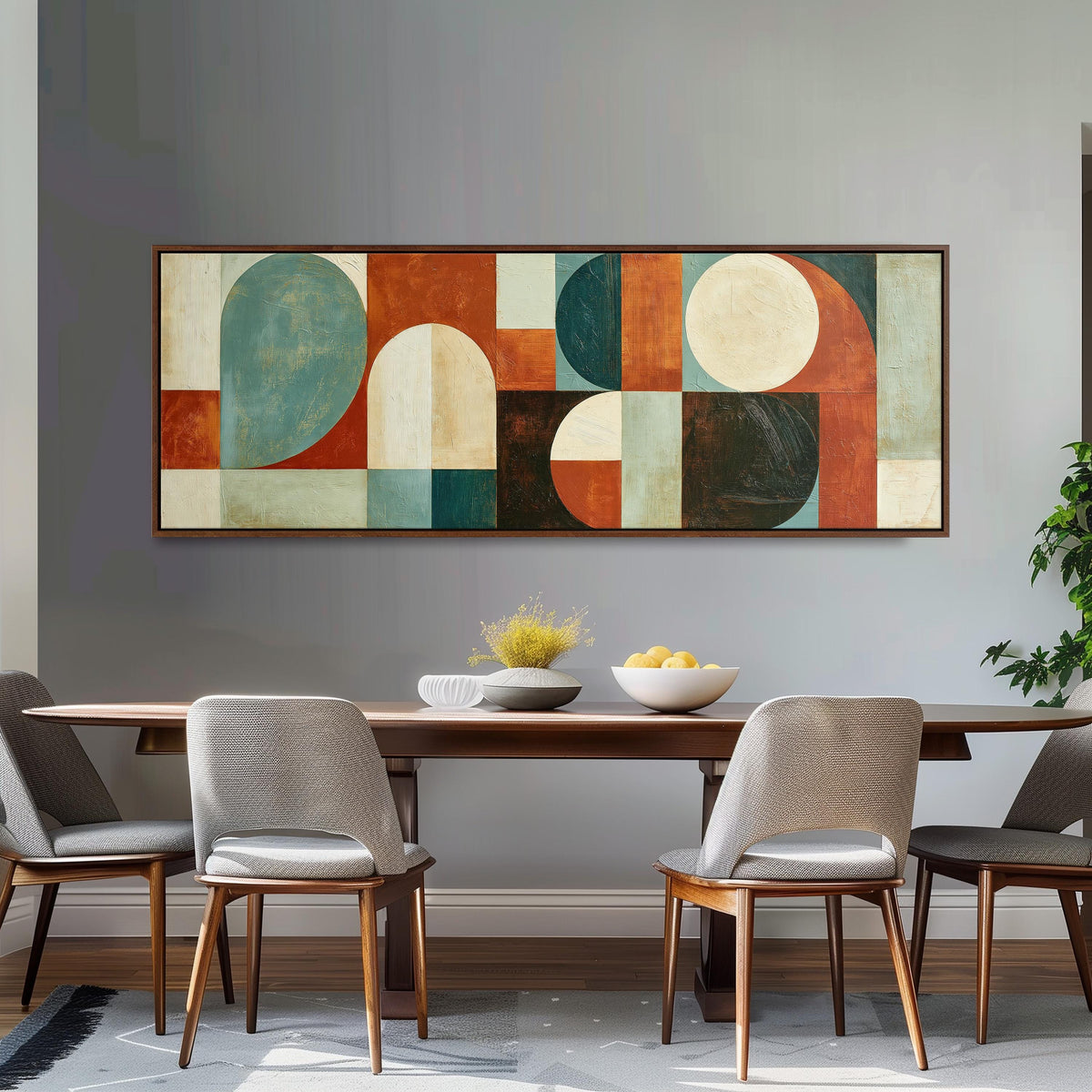 Teal and rust arch and circle shapes long horizontal canvas print above a dining table