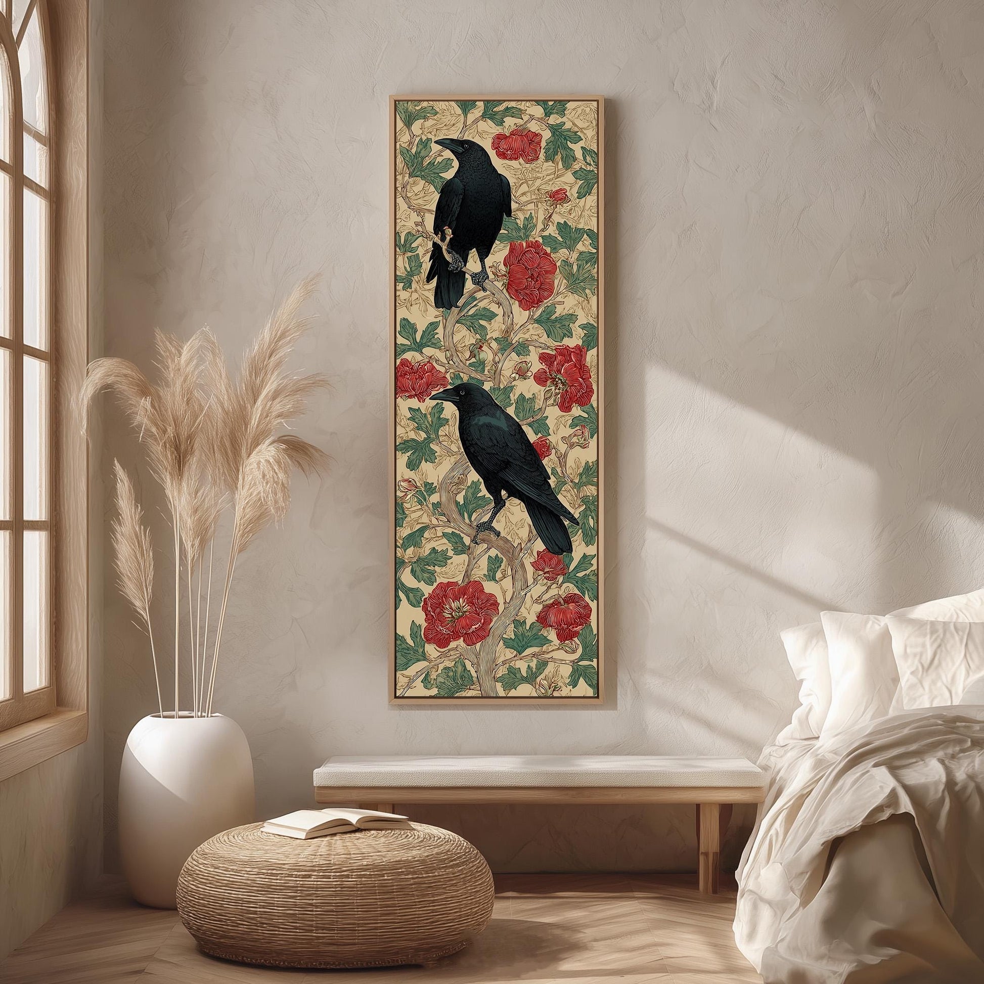 a large, ornate painting of two black birds perched on a branch with red flowers, hanging on a wall in a room with a white bed, a wicker ottoman, and a potted plant.