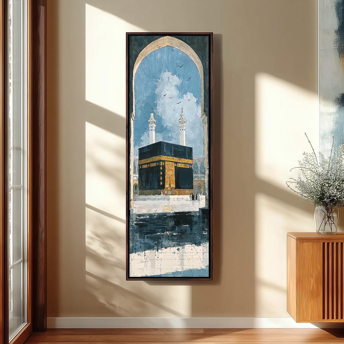 The Kaaba seen through an arch long vertical canvas print in a sunlit living space