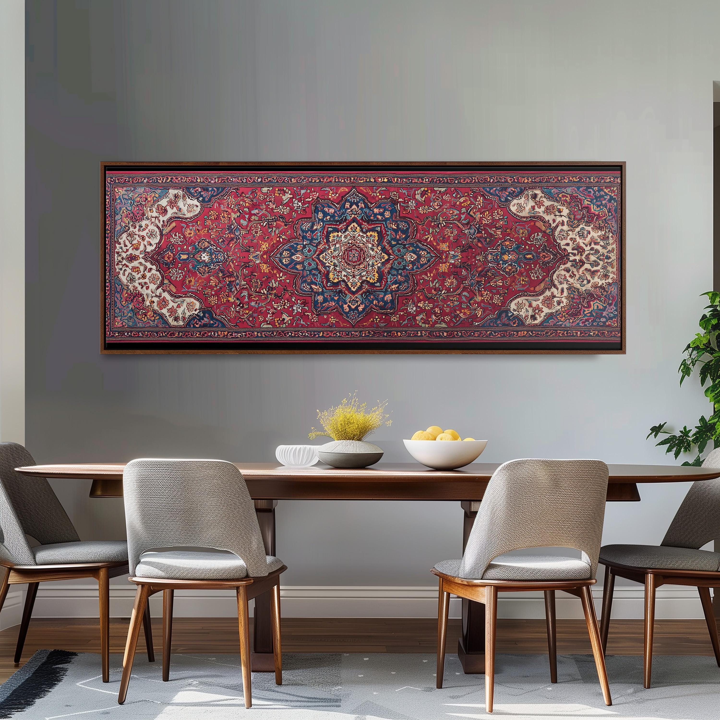a dining room with a wooden table and four chairs, a large framed rug hanging on the wall above the table, and a bowl of fruit on the table.