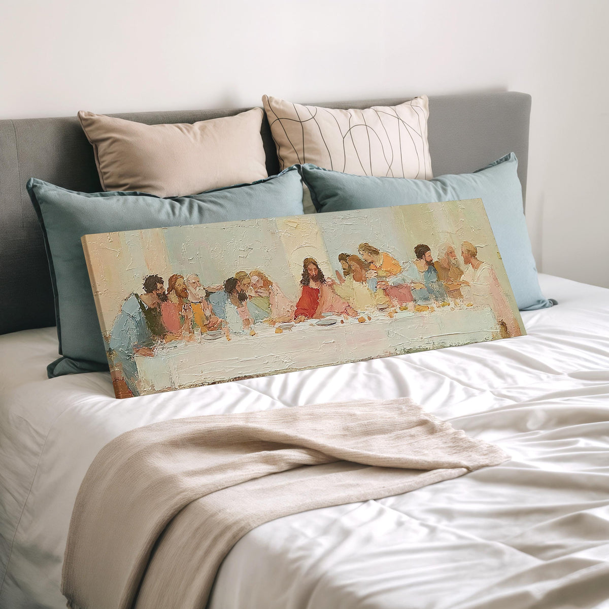 The Last Supper in a classic style wide panoramic canvas print laid on a bed to show its size