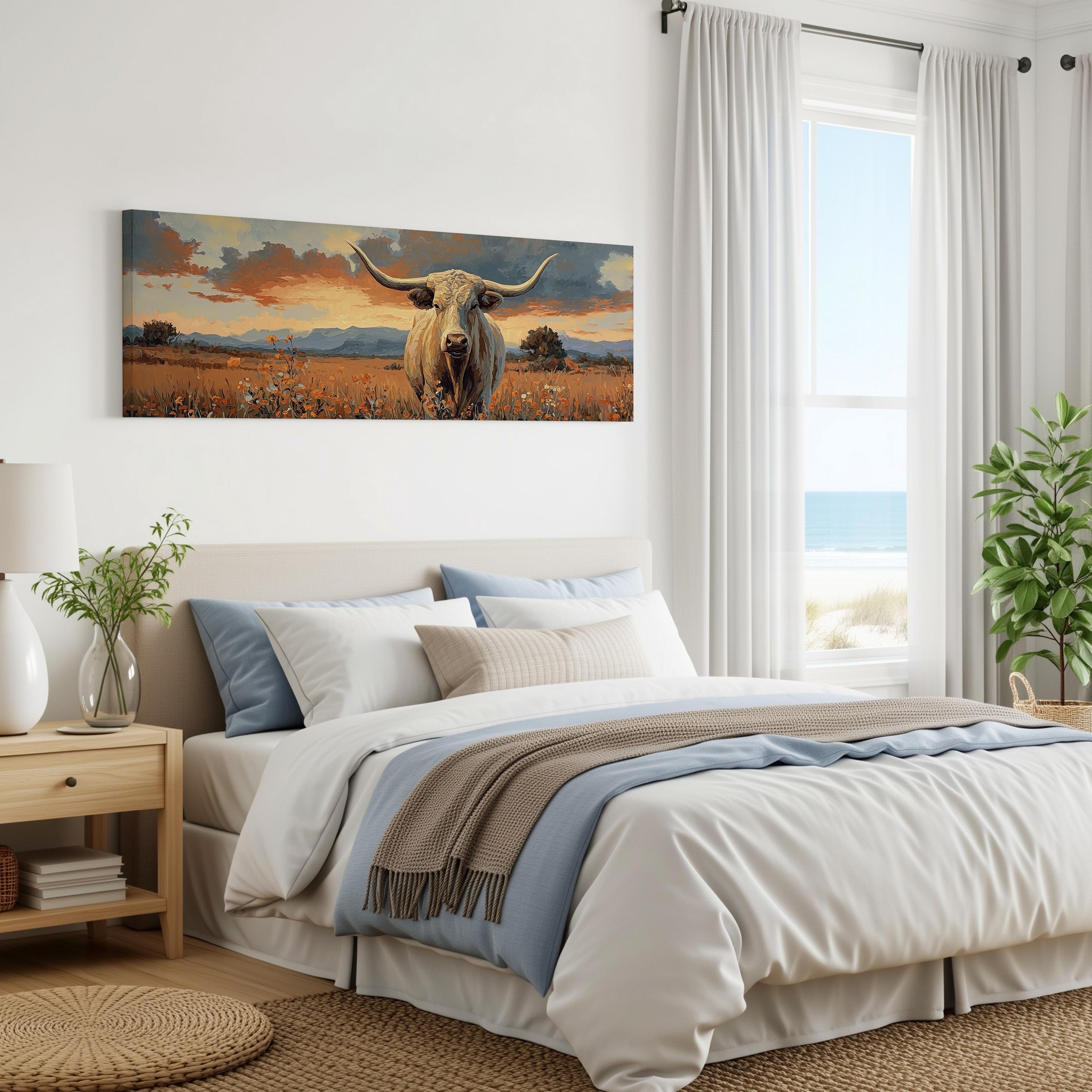 a serene bedroom scene with a large bed, a nightstand, and a painting of a cow in the background. The cow is standing in a field with a cloudy sky above. The room has white walls and a window that offers a view of the ocean.