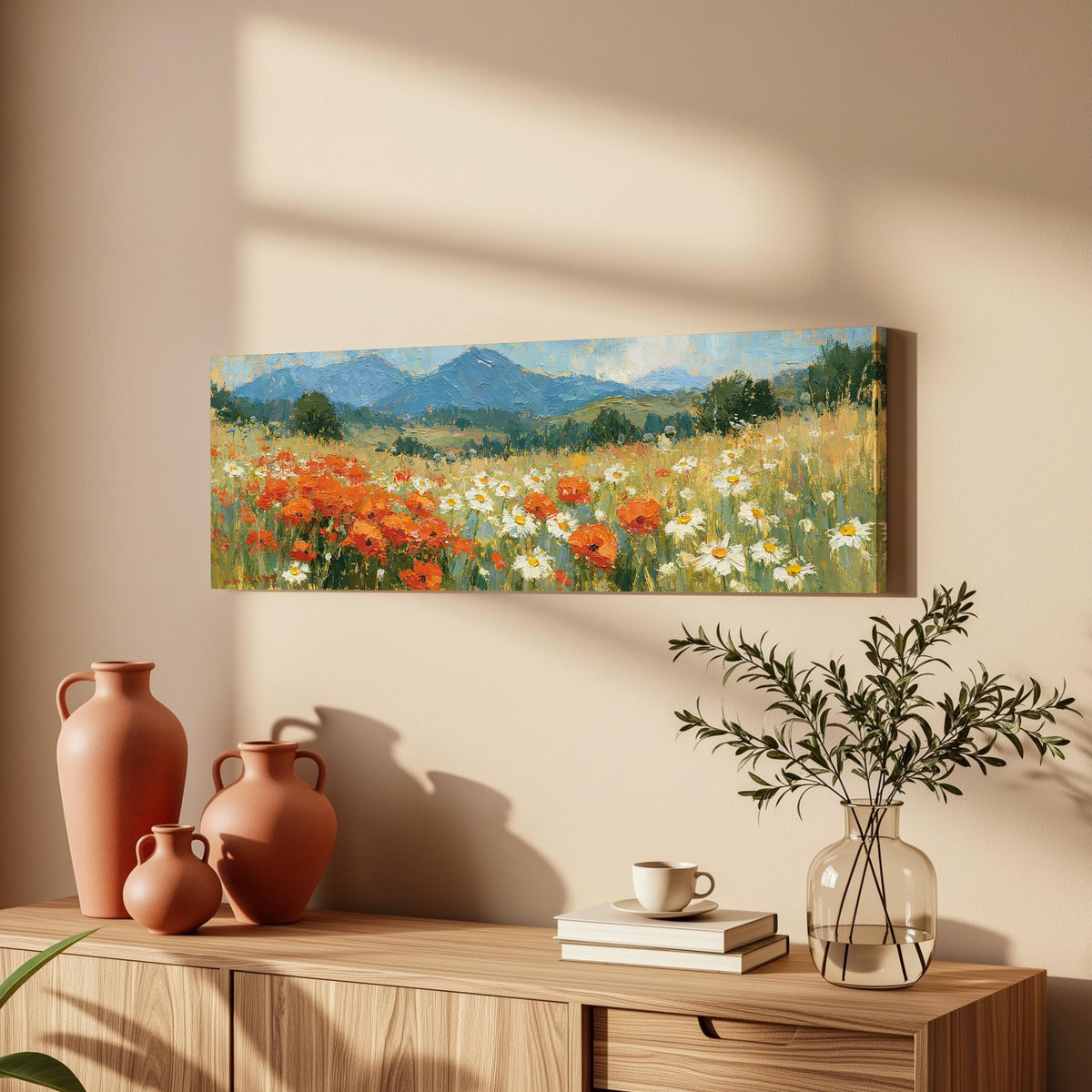 Alpine poppy and daisy meadow long horizontal canvas print above a wooden sideboard