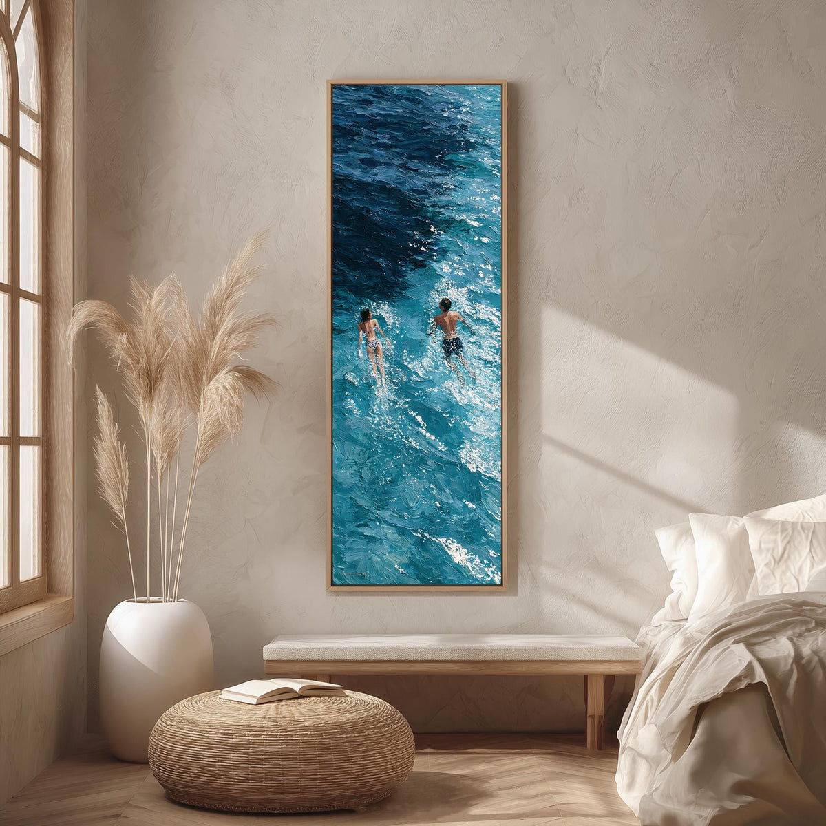 Two swimmers in deep blue waves long vertical canvas print in a bright reading corner
