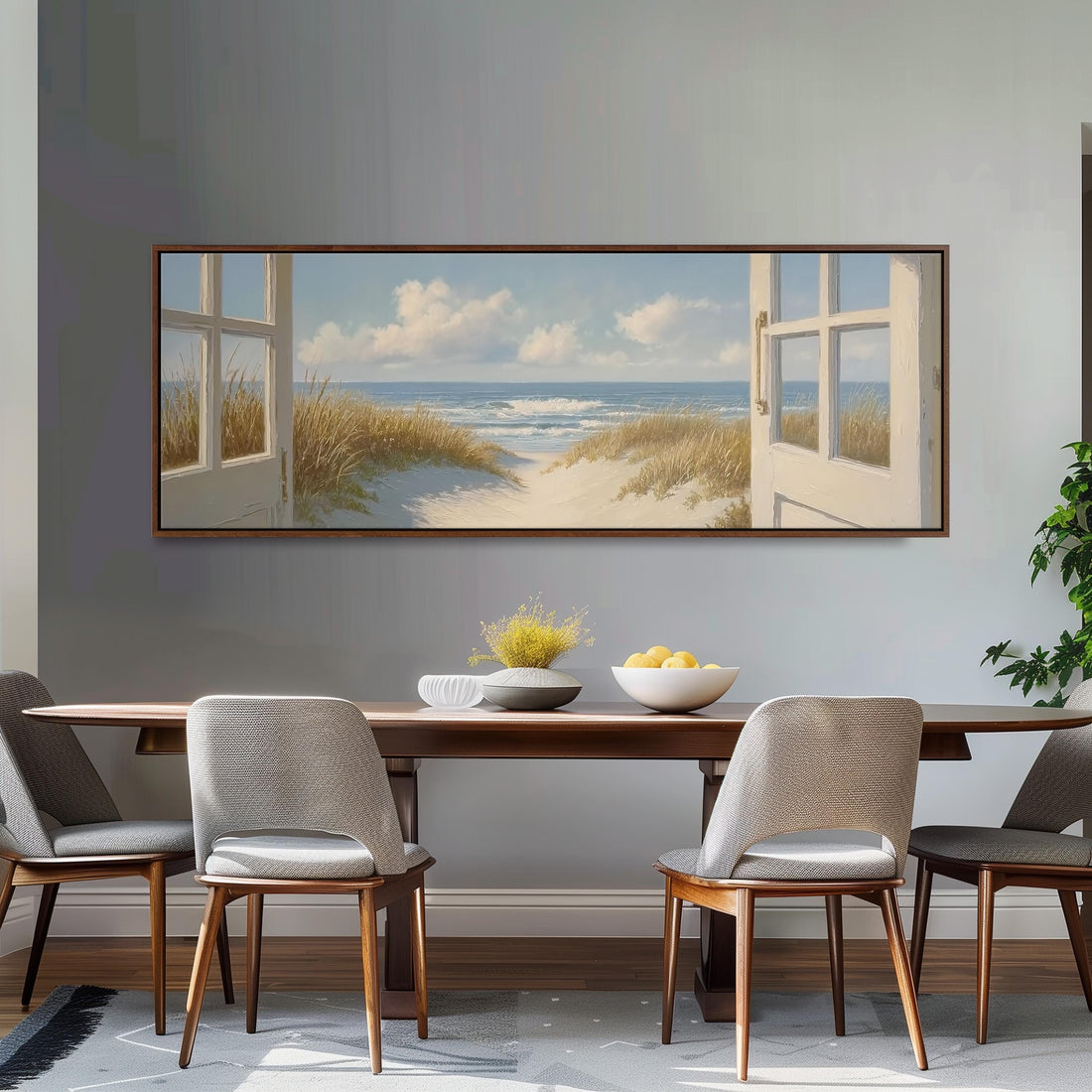 a large framed painting of a beach scene with open windows, hanging above a white sofa with gray and white pillows.