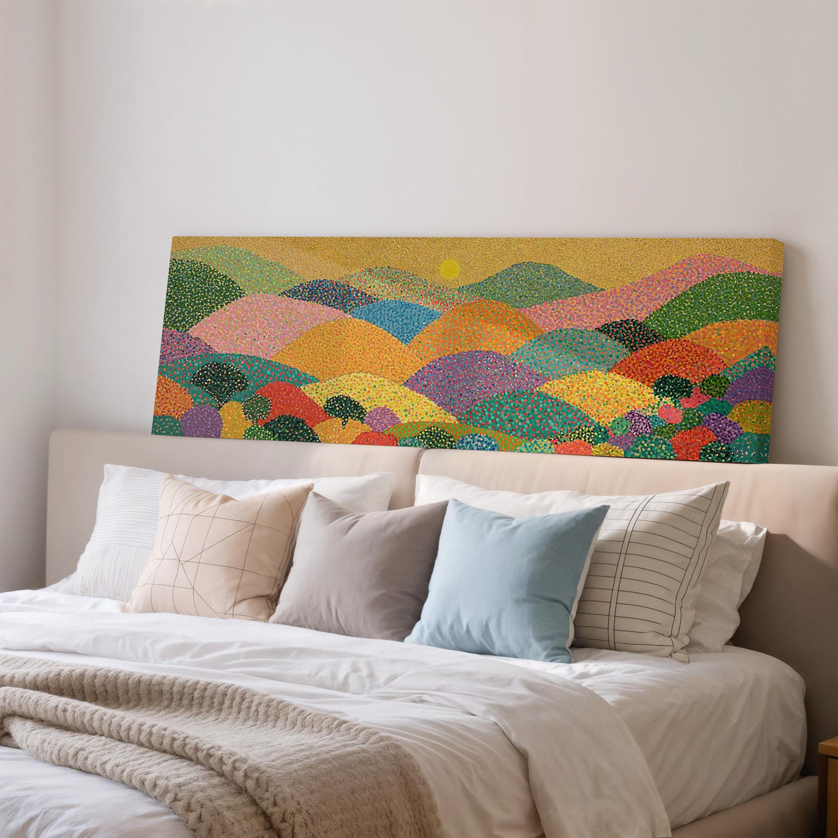 Dotted rainbow hills at sunset wide panoramic canvas print above a bed in a bedroom