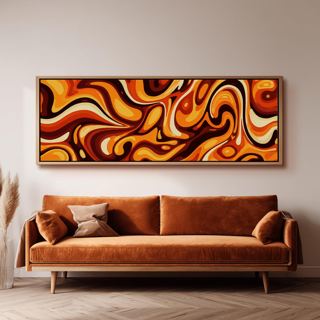 a large abstract painting hanging on a wall above a brown sofa with two pillows.
