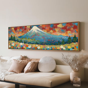 Mount Fuji above autumn trees and wildflowers long horizontal canvas print above a sofa in a living room