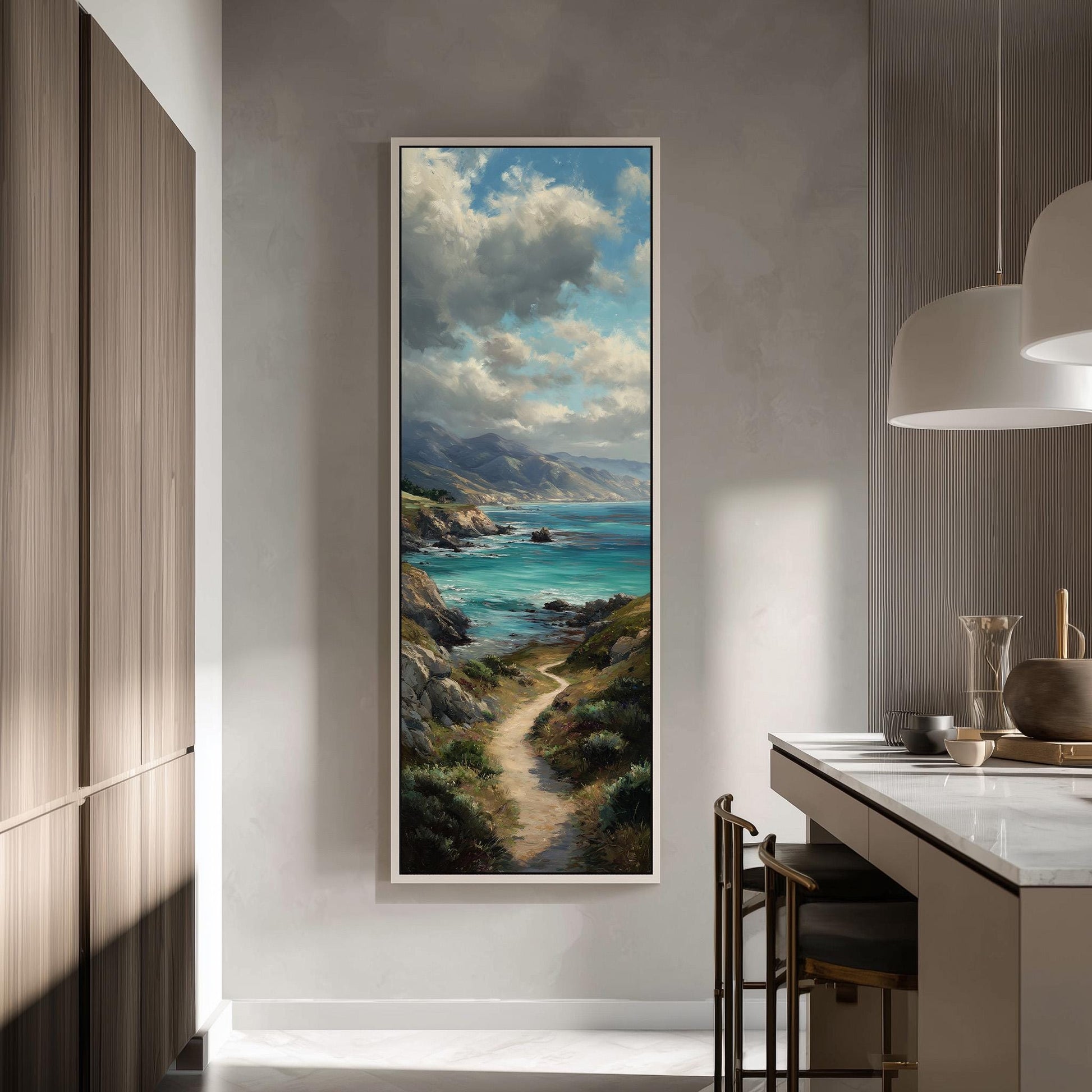 a large painting of a coastal landscape hanging on a wall in a modern kitchen.