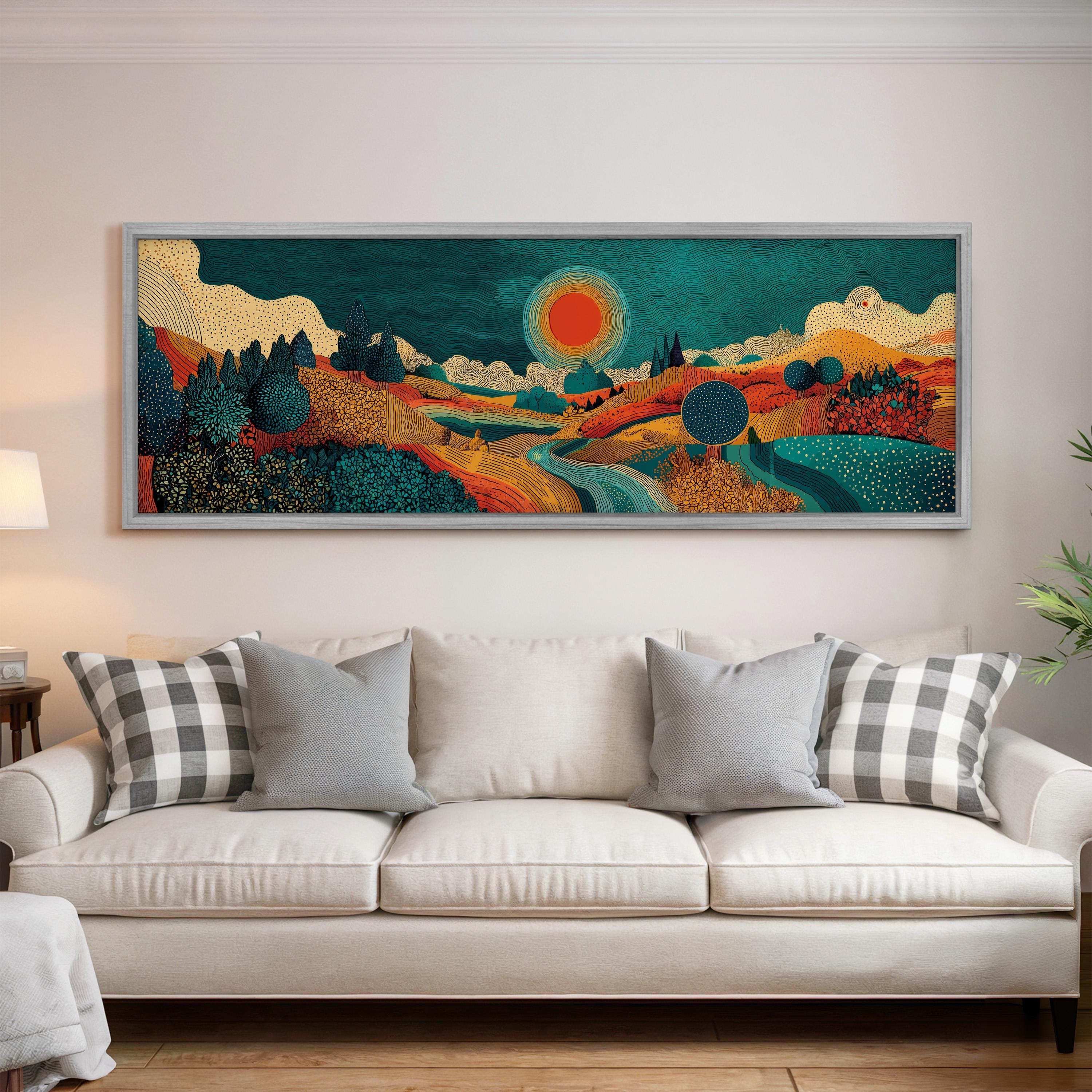 a large, colorful painting hanging on a wall above a white couch in a living room.