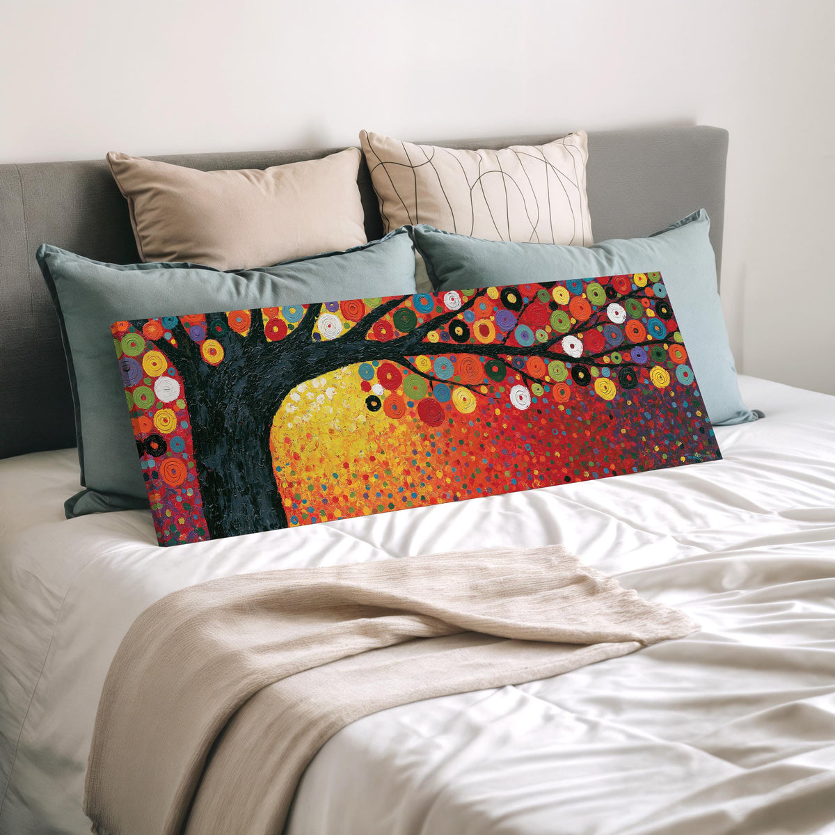 Amber tree of life in a Klimt style wide panoramic canvas print laid on a bed to show its size