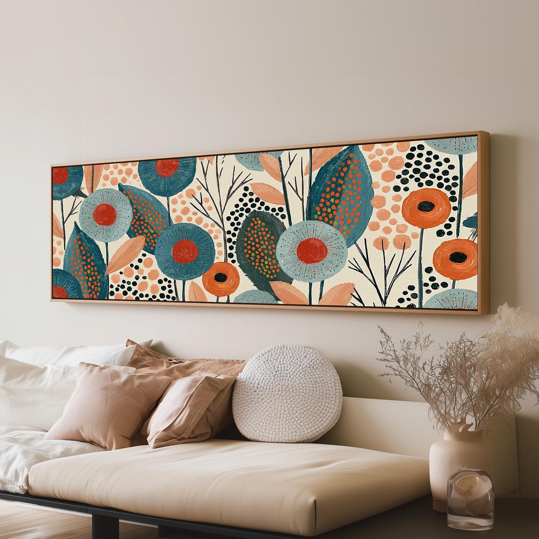 Teal poppies and speckled leaves long horizontal canvas print above a sofa in a living room