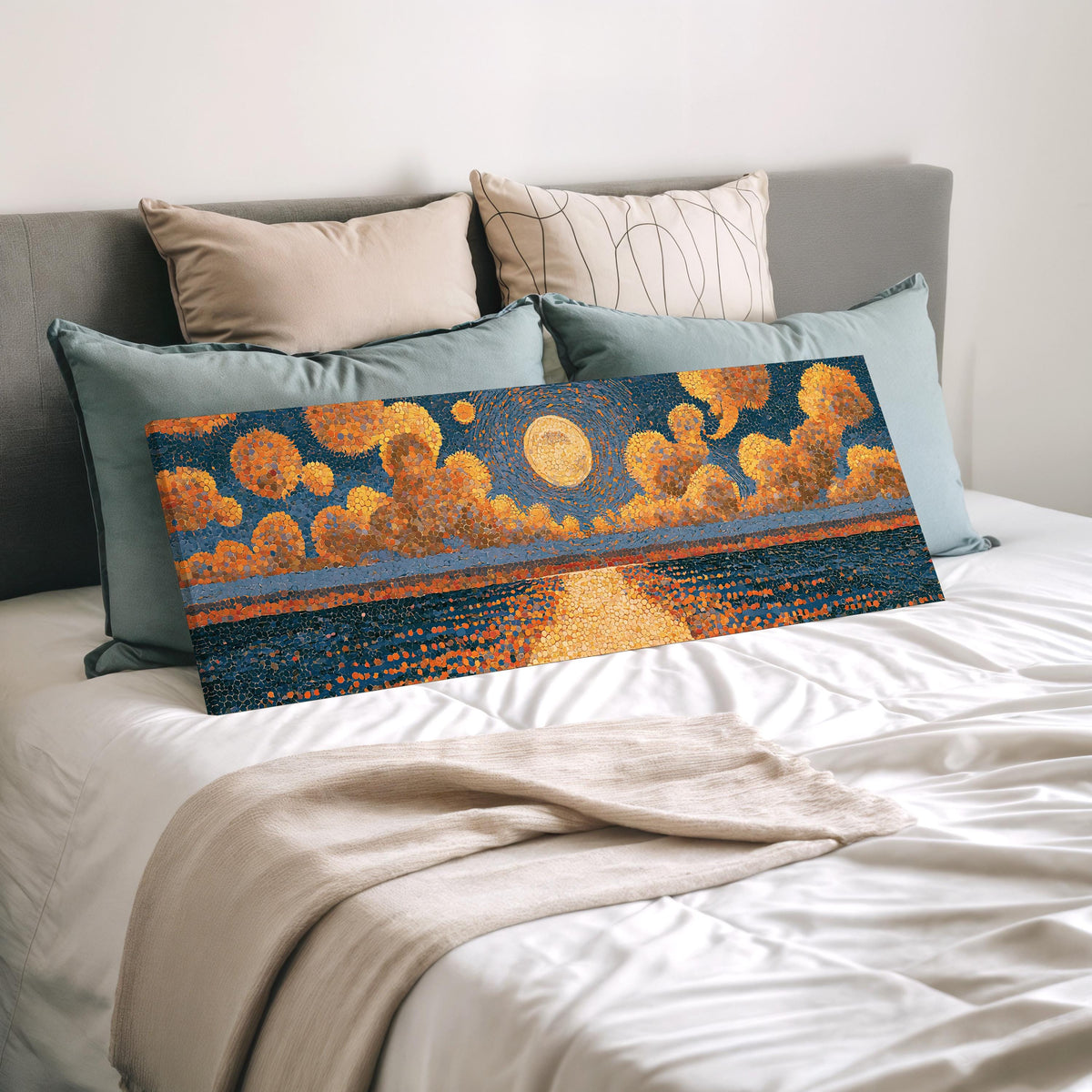 Golden sunset over a lake wide panoramic canvas print laid on a bed to show its size