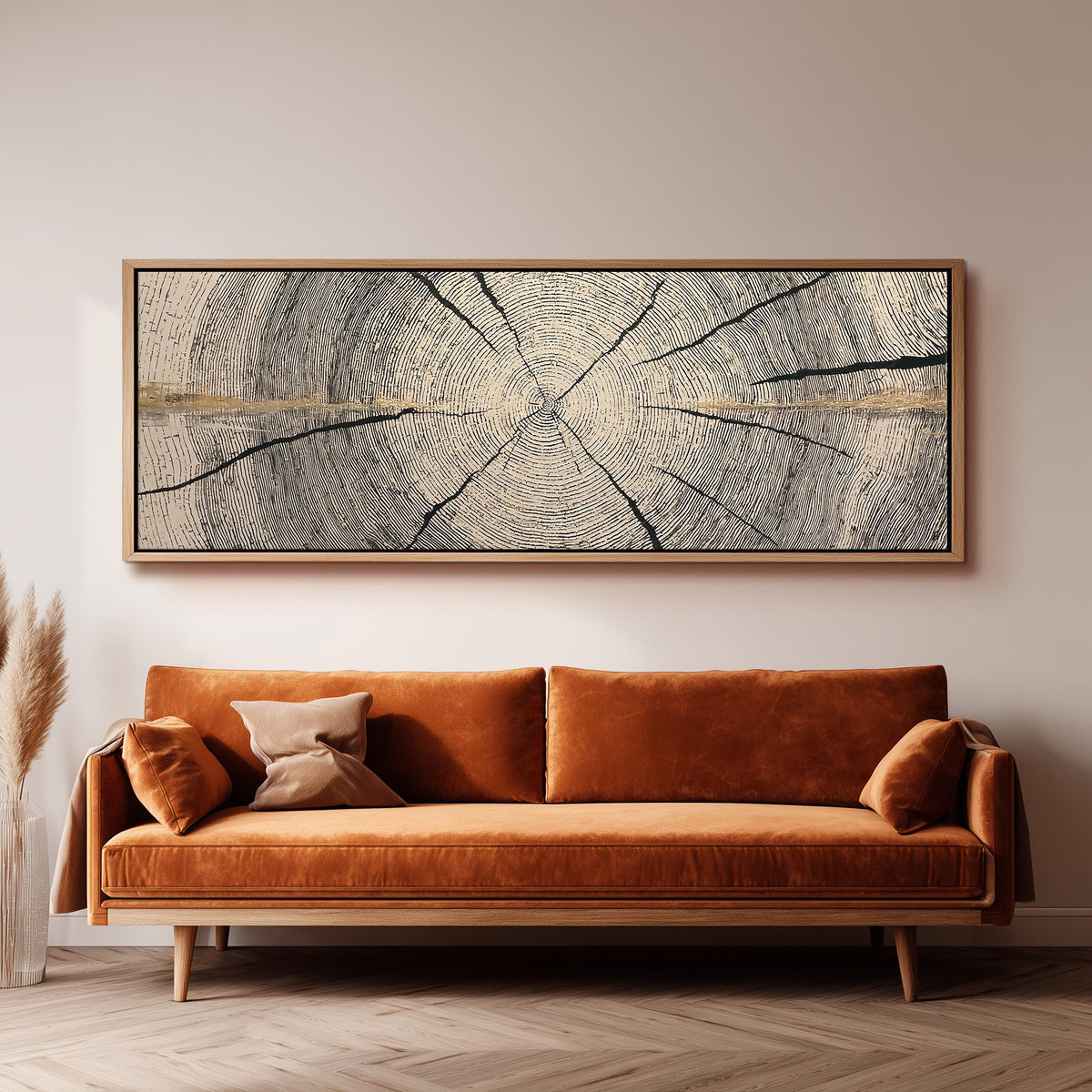 Pale gold wood ring panoramic canvas print above a sofa in a living room