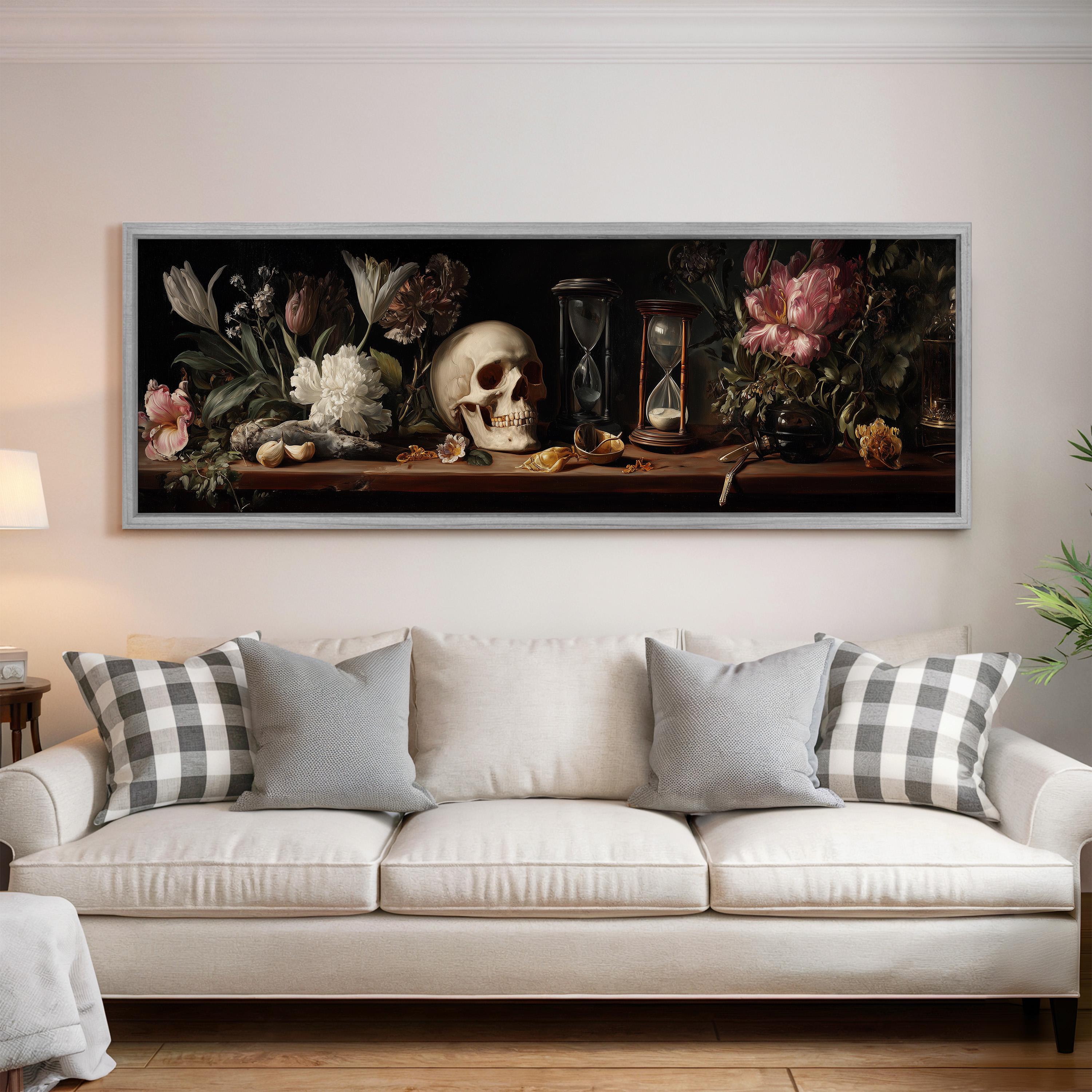 a large painting of a skull and floral arrangement on a wall above a white couch with patterned throw pillows.