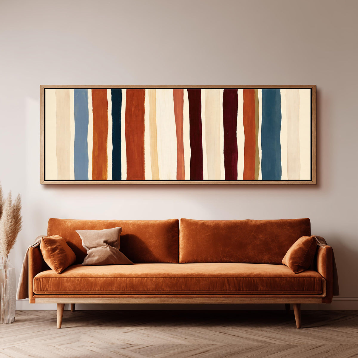Rust, navy and maroon stripes long horizontal canvas print above a sofa in a living room