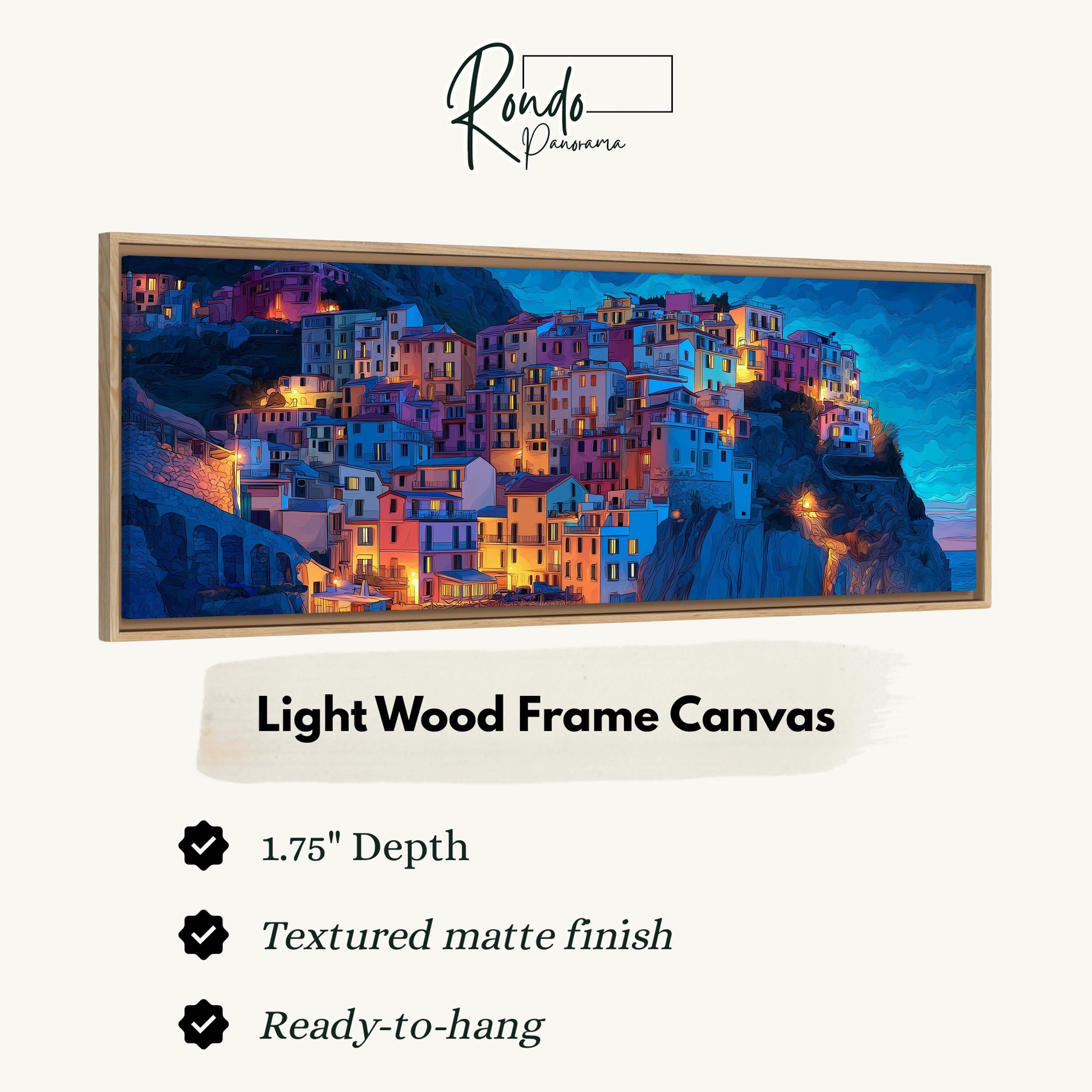 The image is a framed canvas depicting a colorful, densely packed cityscape with buildings illuminated at night.