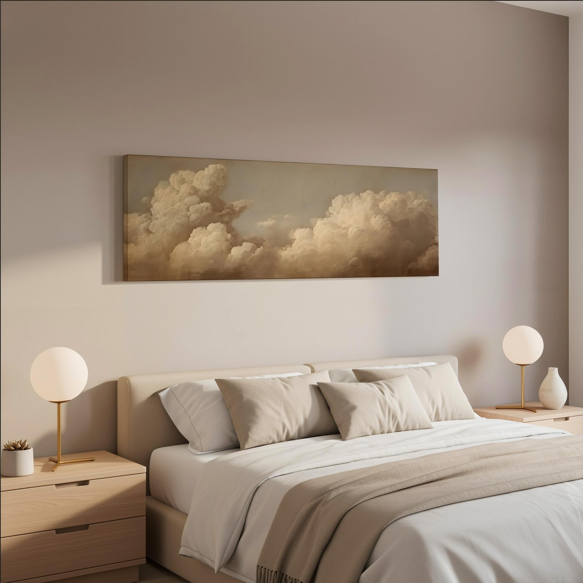 a serene bedroom scene with a large bed adorned with white pillows and a gray blanket, flanked by two white lamps on nightstands. Above the bed hangs a large painting of a cloudy sky, creating a calming and peaceful atmosphere in the room.