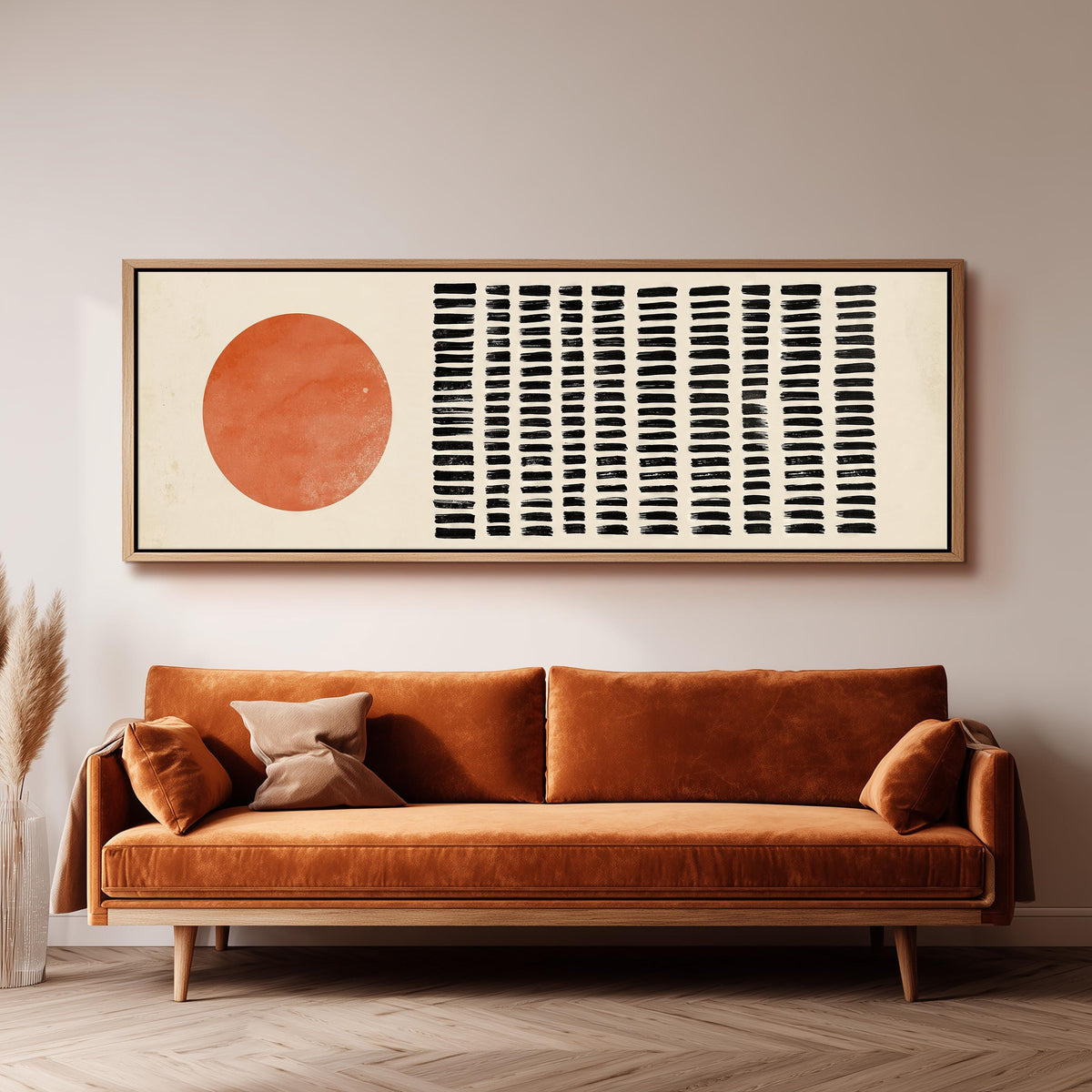 Orange sun beside rows of black dashes panoramic canvas print above a sofa in a living room