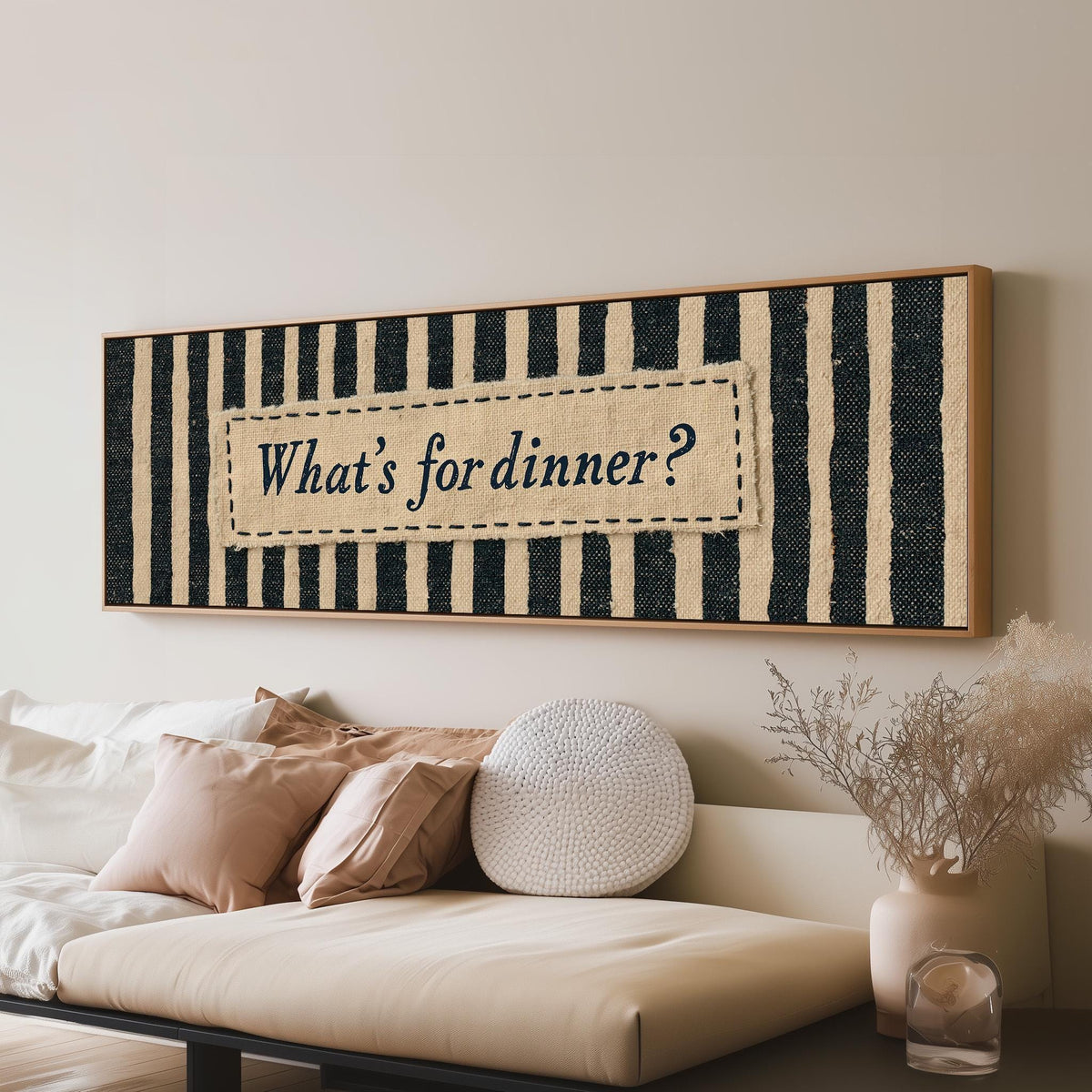 What's for dinner sign on black stripes panoramic canvas print above a sofa in a living room