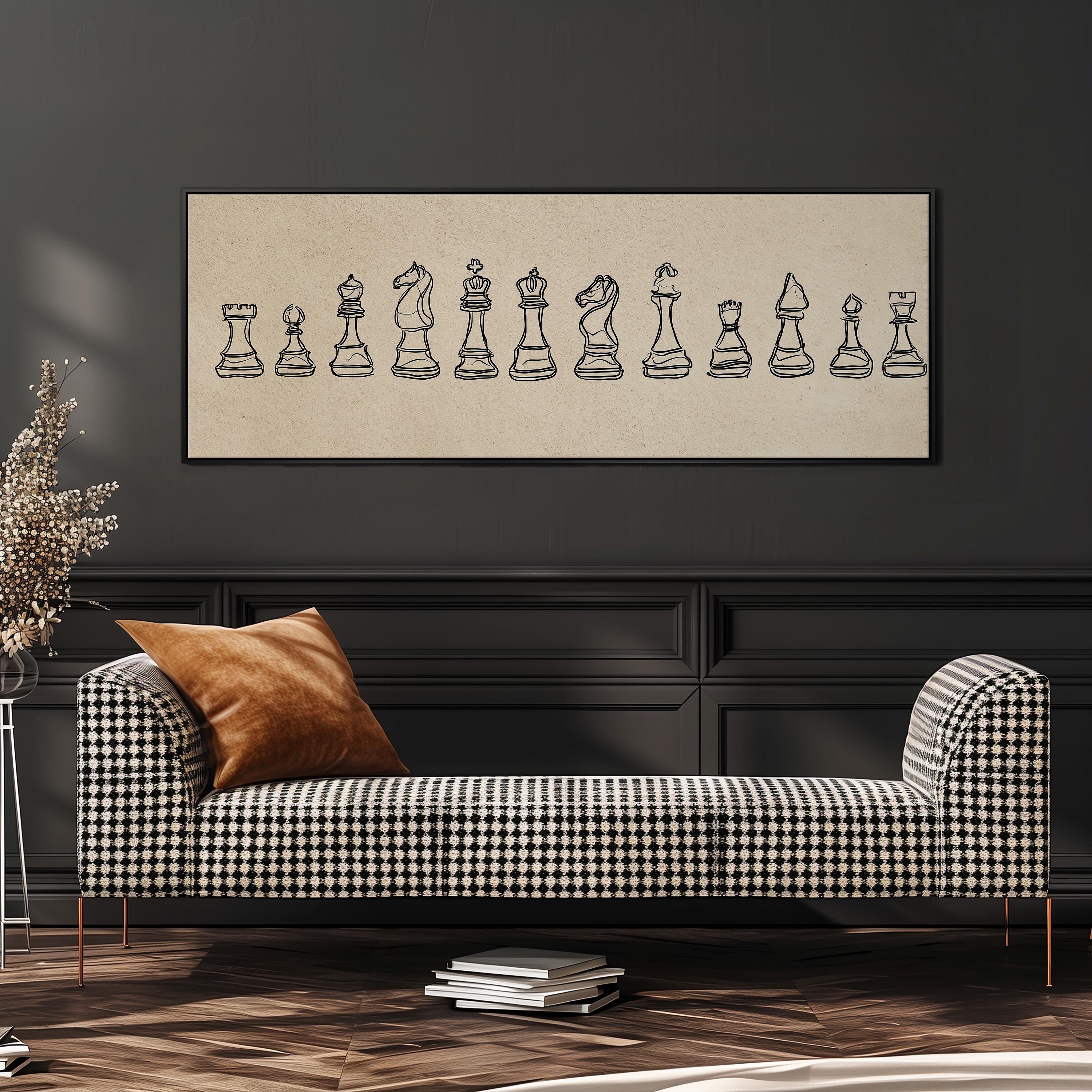 a black and white checkered sofa with a brown throw pillow, set against a dark wall with a framed illustration of chess pieces above it.