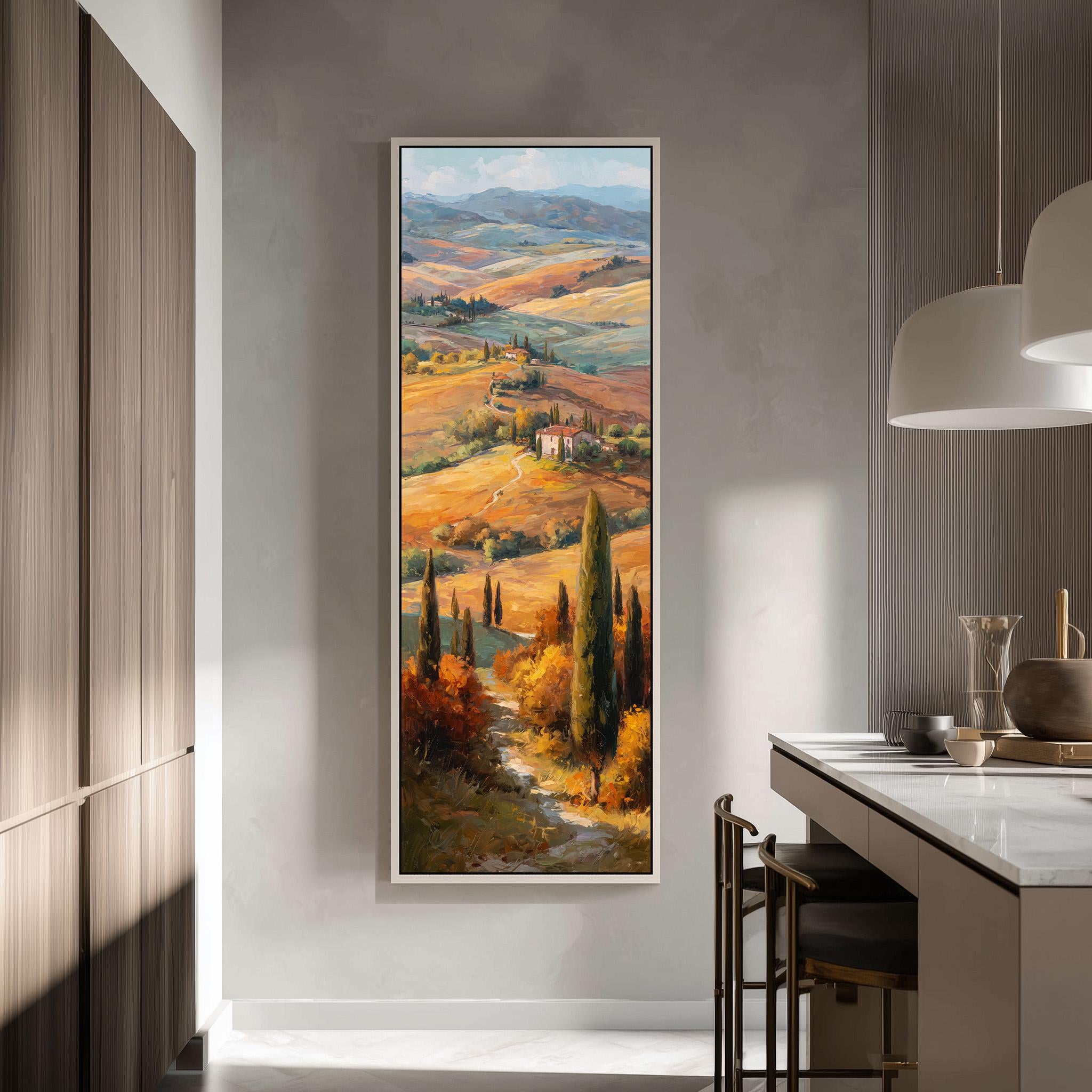 a large, framed painting of a picturesque countryside landscape hanging on a wall in a modern kitchen.
