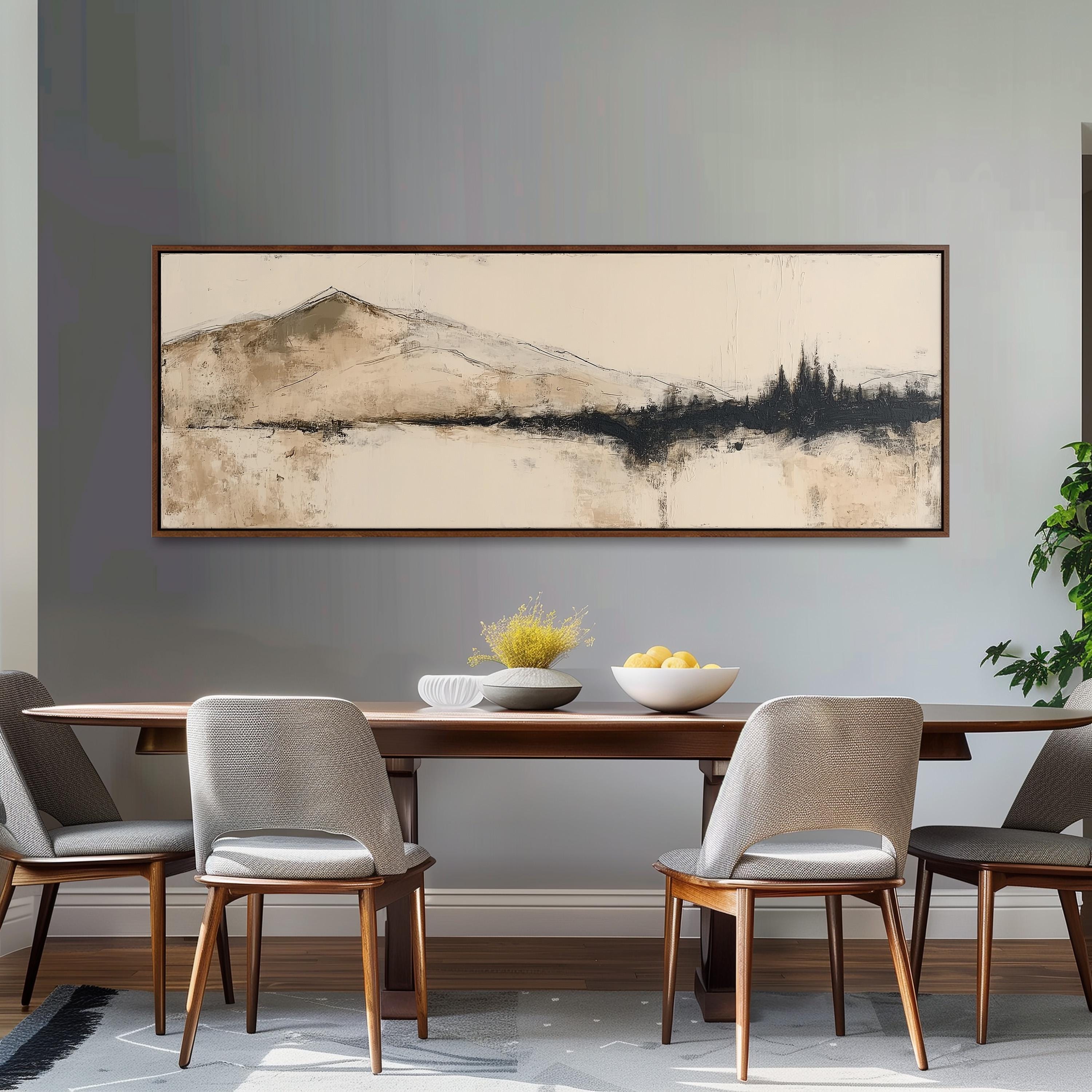 a dining room with a large painting of a mountain landscape hanging on the wall above a wooden dining table with four chairs. The table is set with a bowl of fruit and a vase of flowers, creating a cozy and inviting atmosphere.