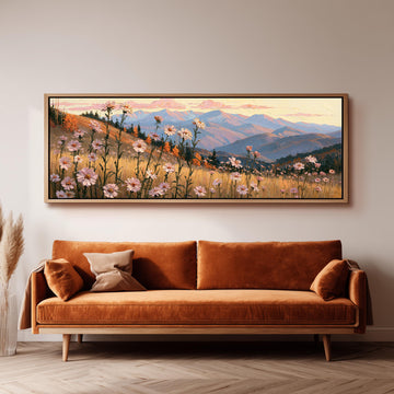Wildflower meadow with mountains long horizontal canvas print above a sofa in a living room