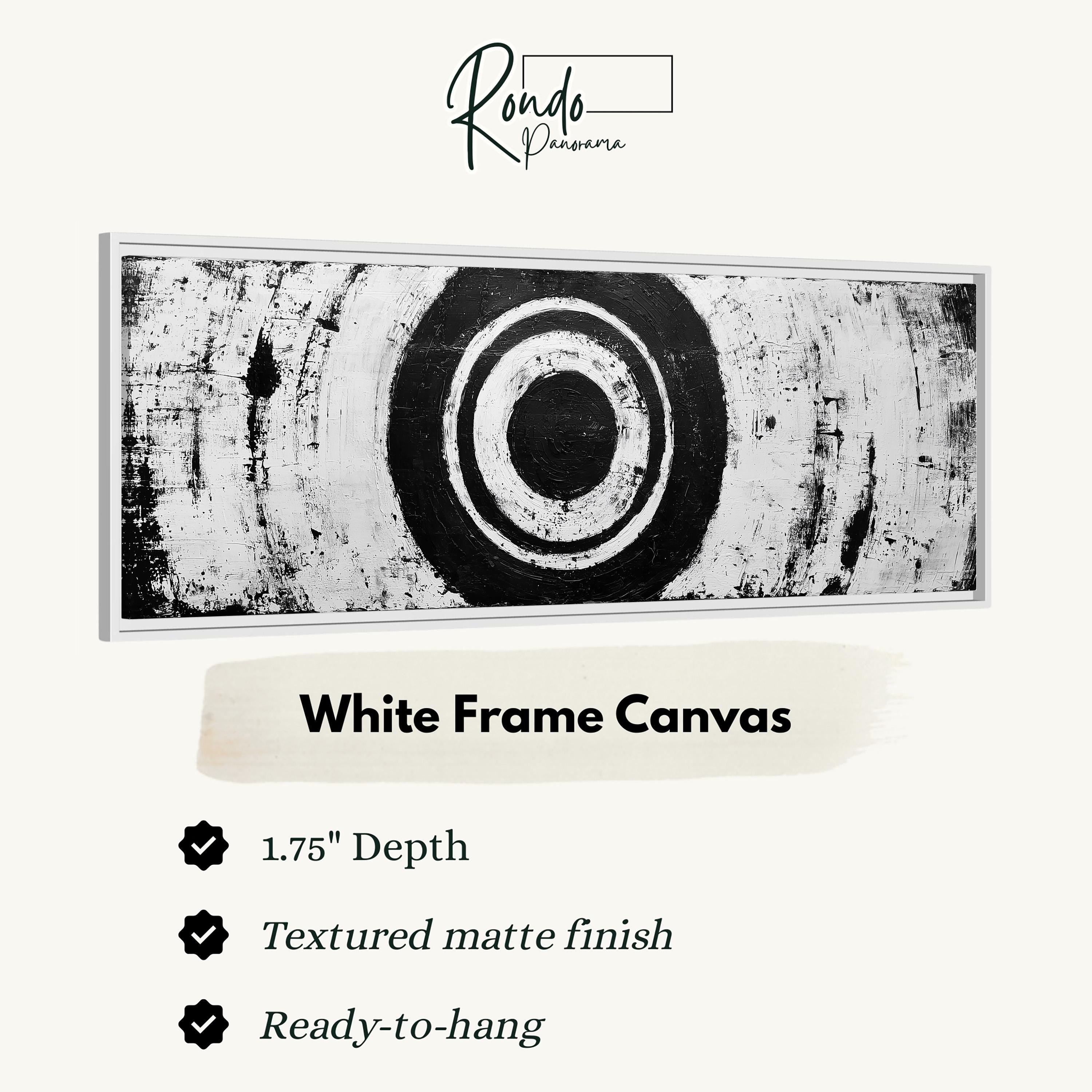 The image is a white frame canvas with a black and white abstract design featuring a large circle in the center.