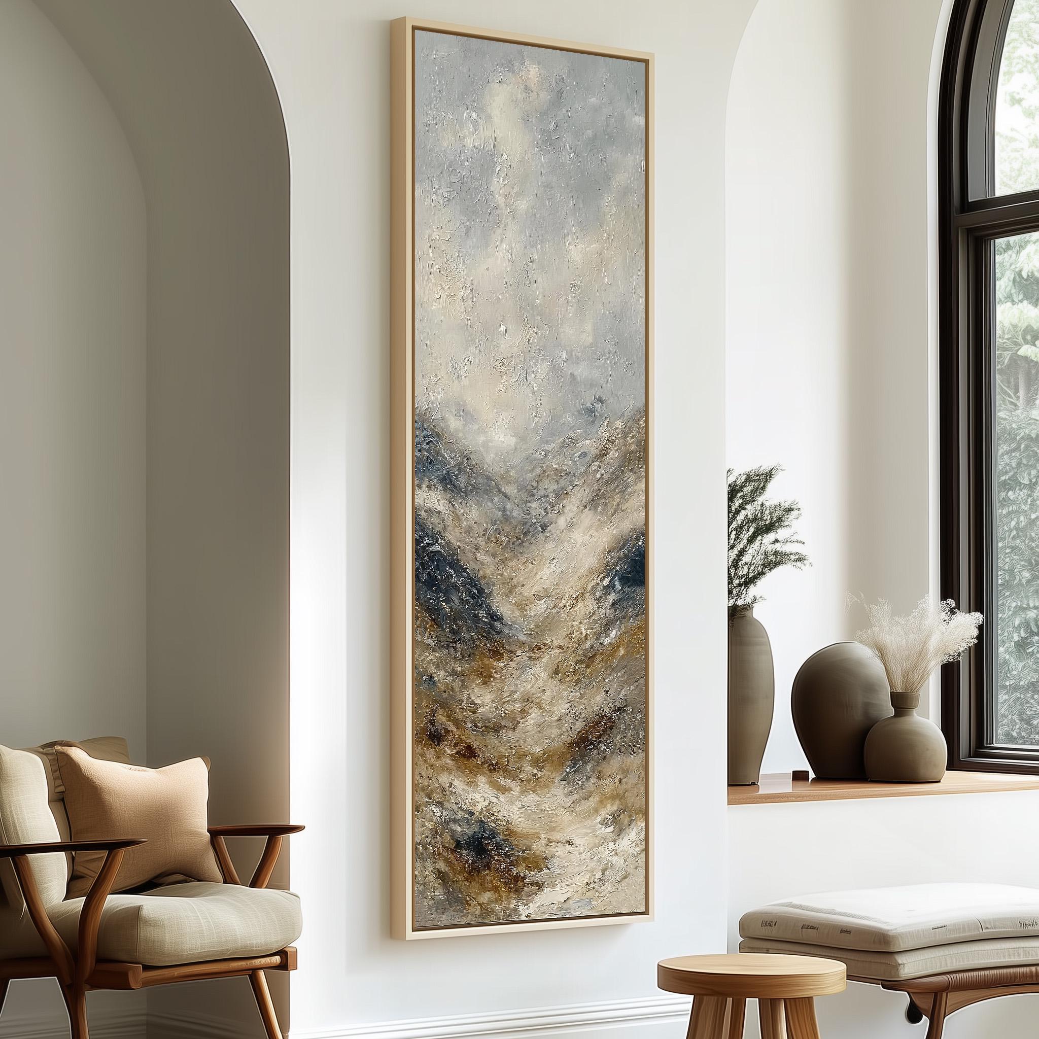 a large, abstract painting hanging on a white wall in a modern living room. The painting has a mix of blue, brown, and white colors, creating a serene and artistic atmosphere. The room is furnished with a wooden chair, a small table, and a window with a plant on the sill, adding a touch of nature and warmth to the space.