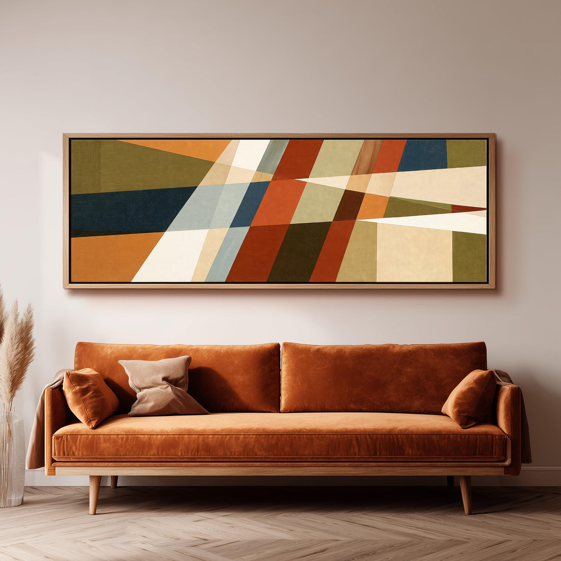 Rust and navy diagonal color blocks long horizontal canvas print above a sofa in a living room