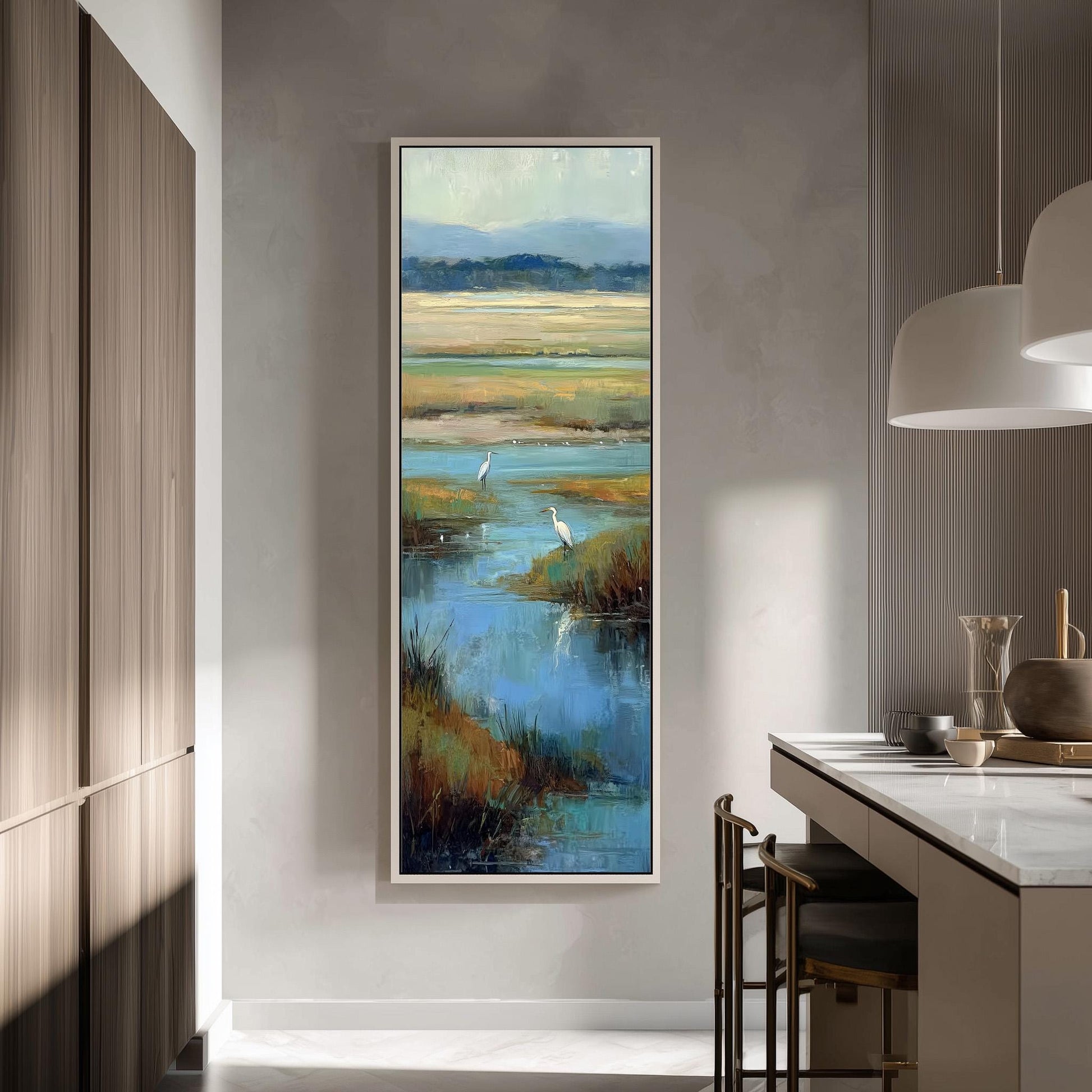 a large painting of a serene landscape with a body of water and two birds, hanging on a wall in a modern kitchen.