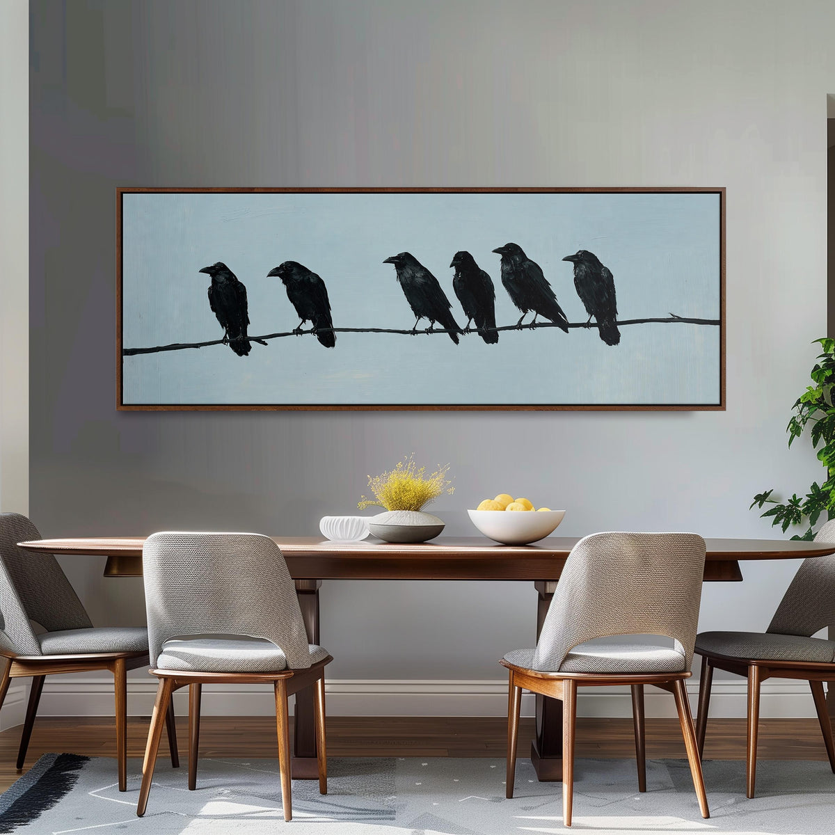 Ravens spaced along a wire long horizontal canvas print above a dining table