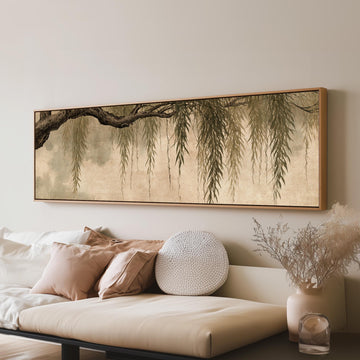 Hanging willow branches long horizontal canvas print above a sofa in a living room