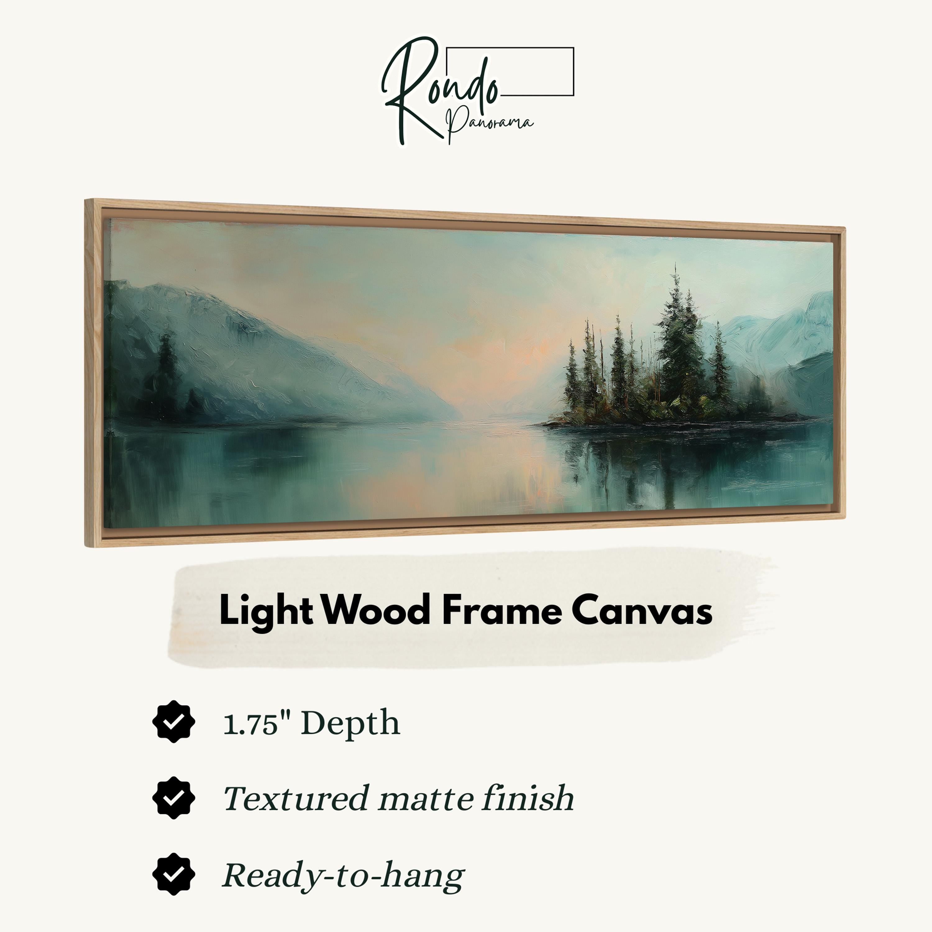 The image is a light wood frame canvas depicting a serene landscape with a lake and mountains in the background.