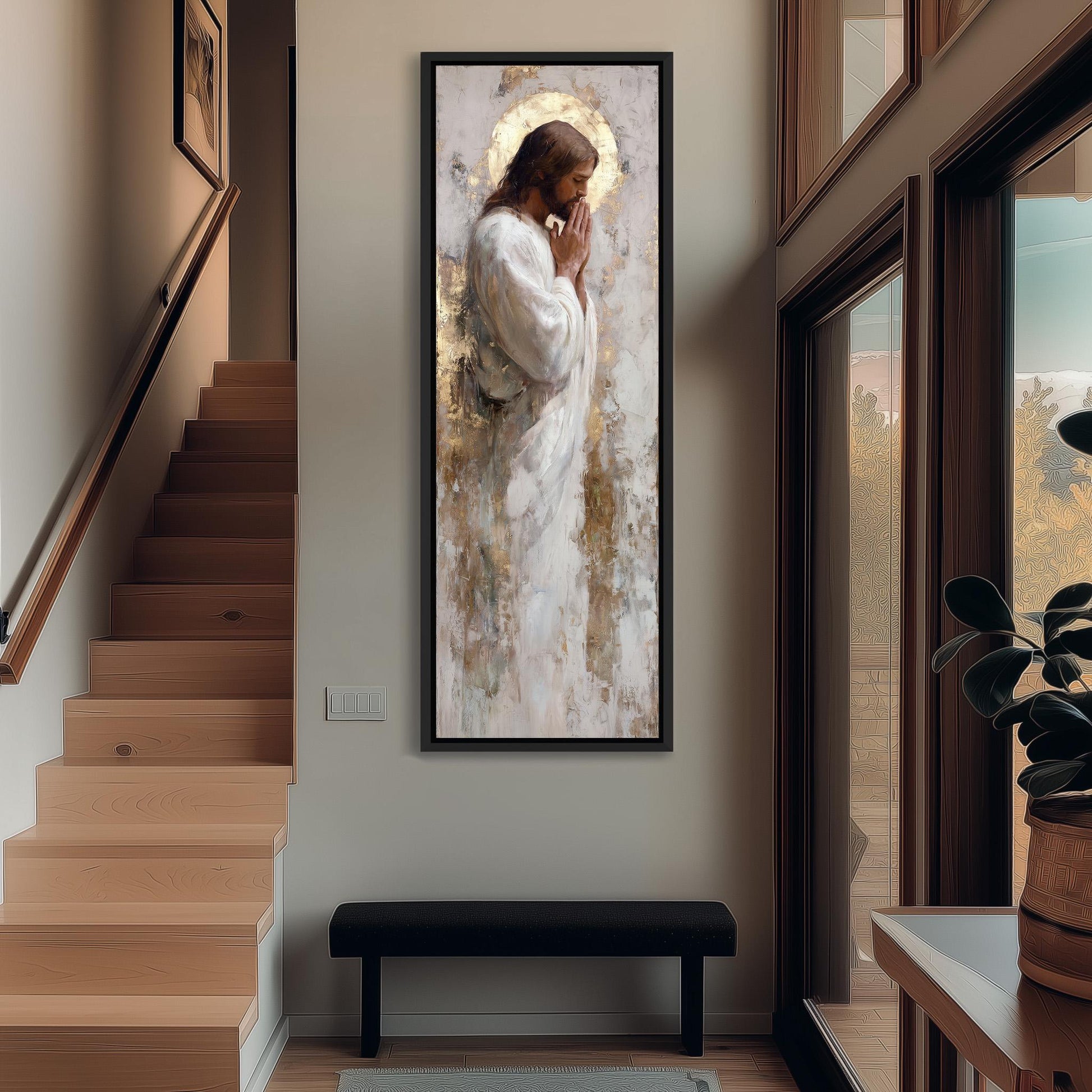 a large painting of Jesus Christ hanging on the wall of a room with wooden stairs and a bench.
