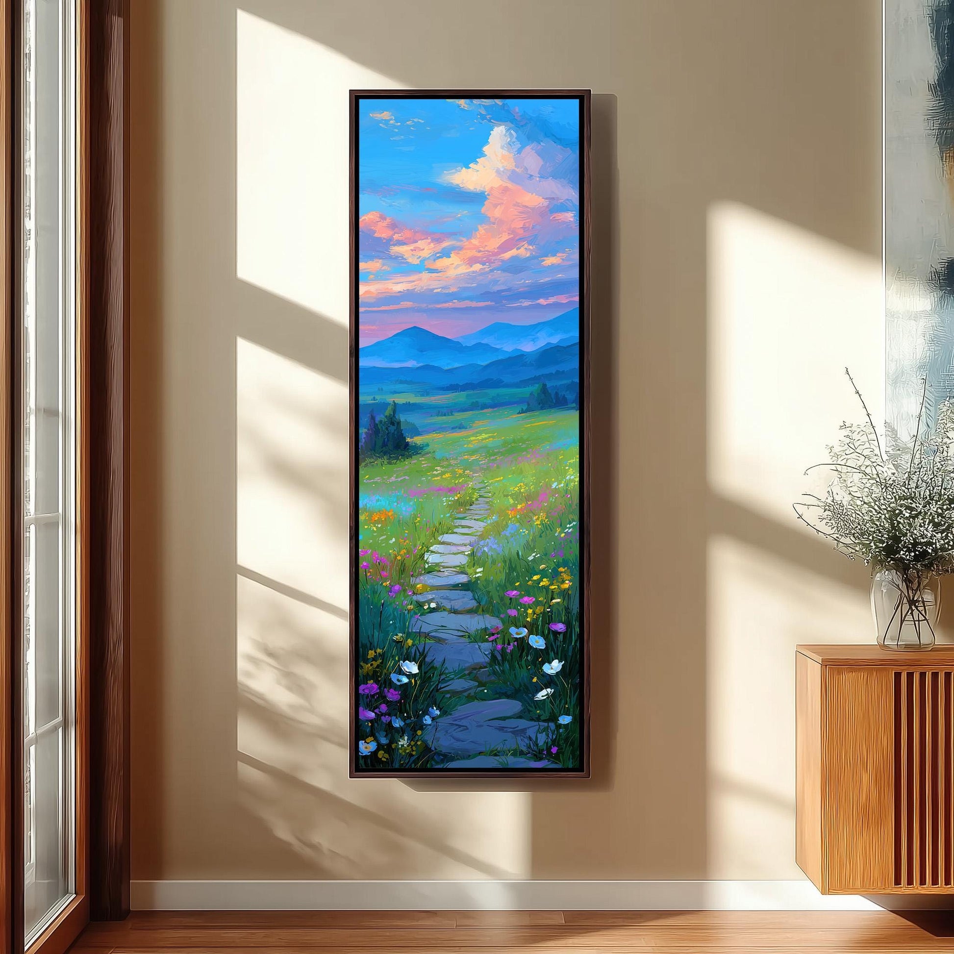 a large, colorful painting of a winding path leading through a lush, flower-filled field, with mountains visible in the distance under a vibrant sky.
