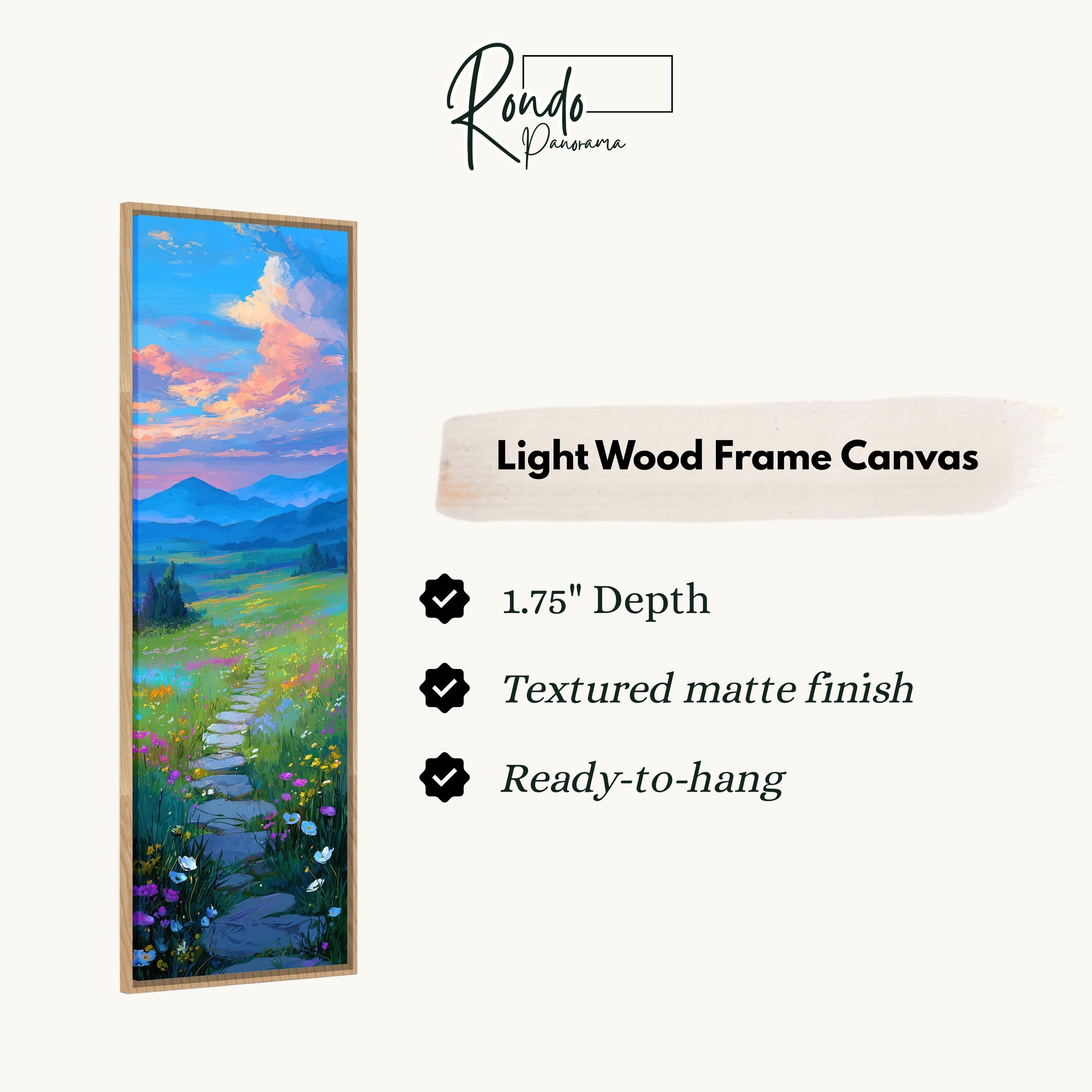 The image is a light wood frame canvas depicting a scenic landscape with a winding path leading through a field of flowers and mountains.