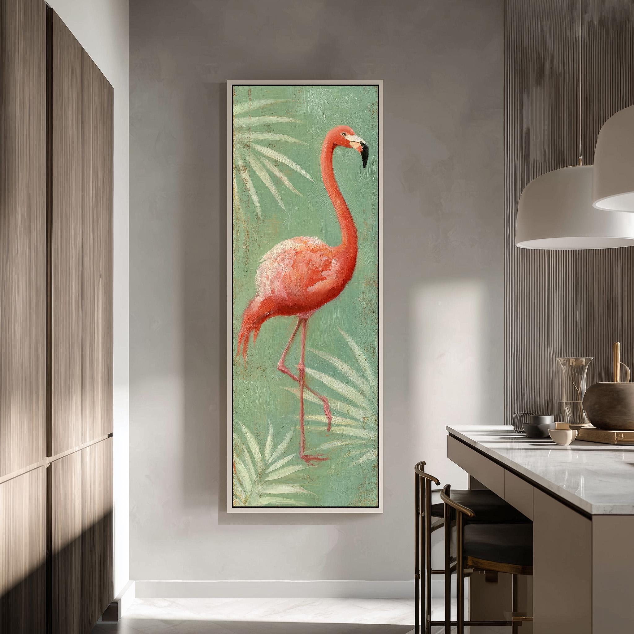 a large framed painting of a pink flamingo standing on one leg, surrounded by green leaves, hanging on a wall in a modern kitchen.