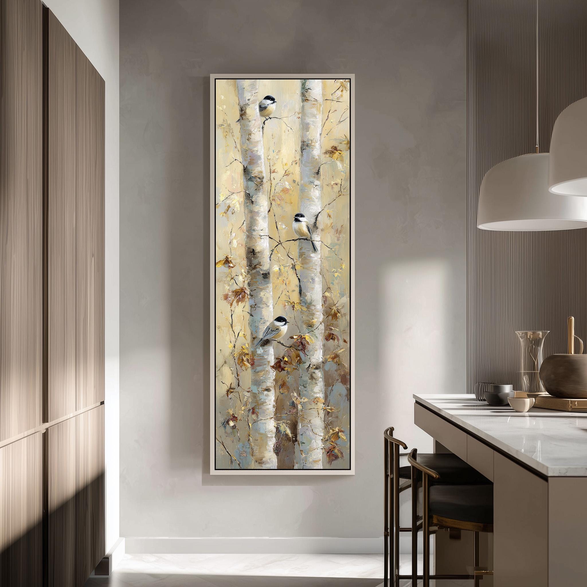 a large painting of birch trees hanging on a wall in a modern kitchen.